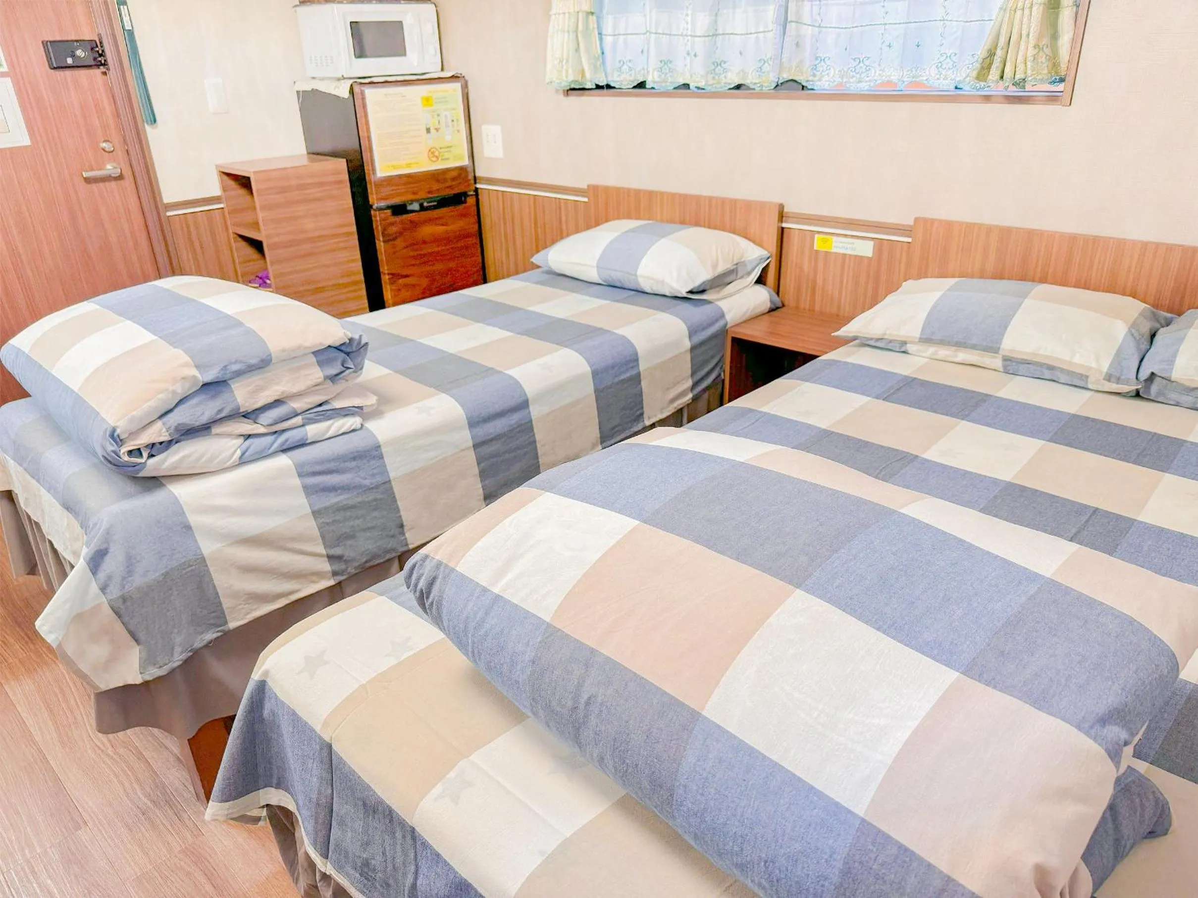 Bed in SHINJUKU WARM VILLA I