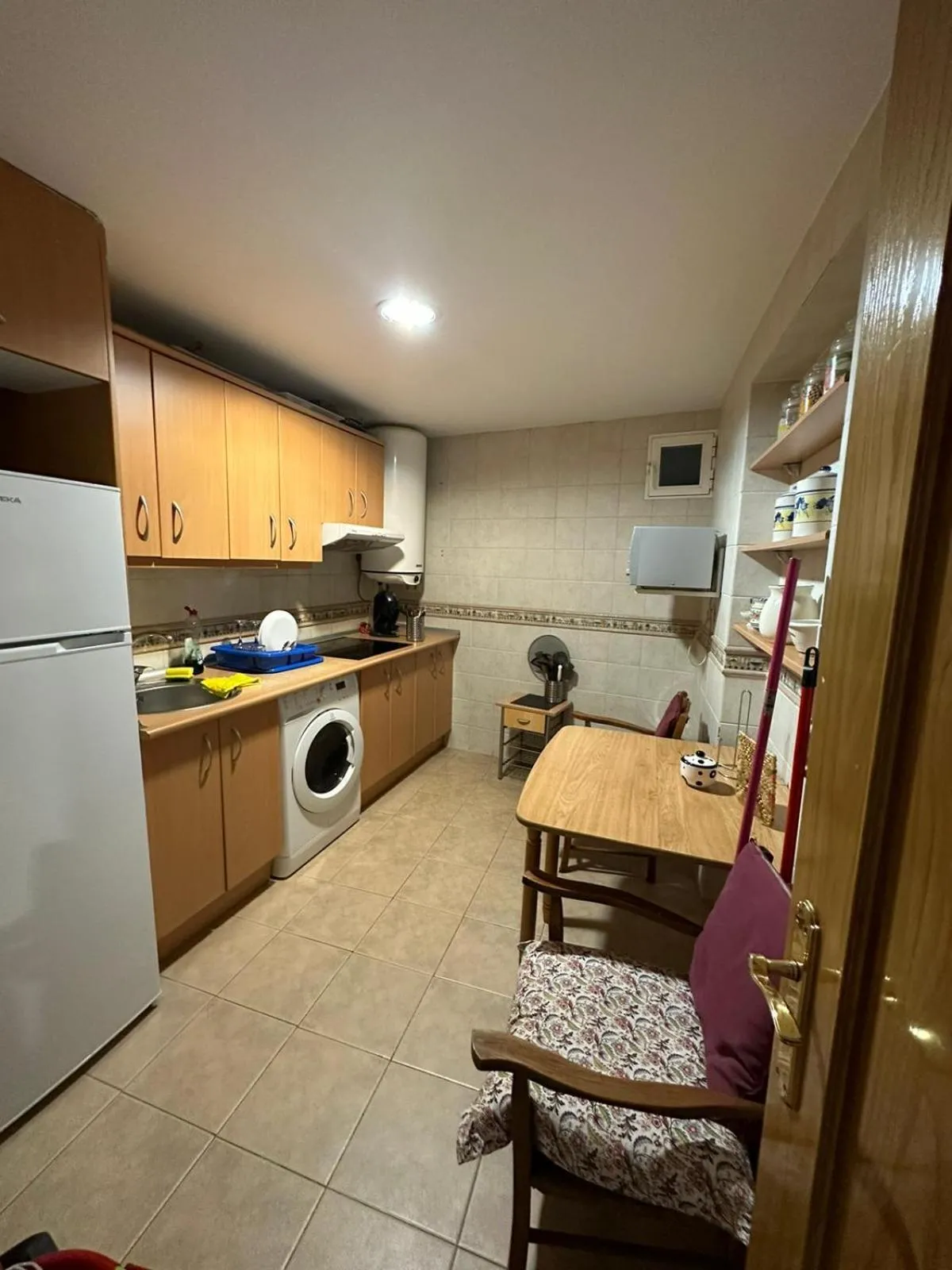 Kitchen or kitchenette in PUERTA DEL SOL Carretas APARTAMENTS & Rooms