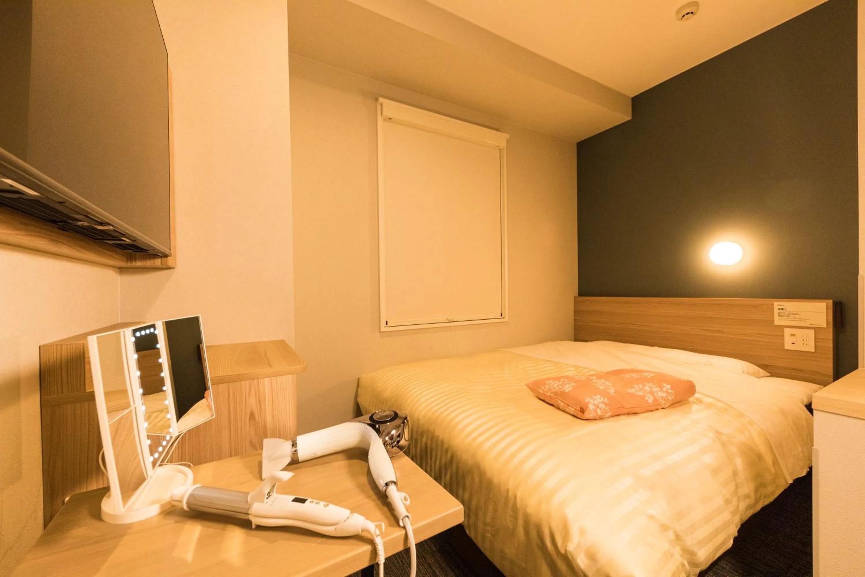 Bed in Super Hotel Premier Ikebukuro Natural Hot Spring