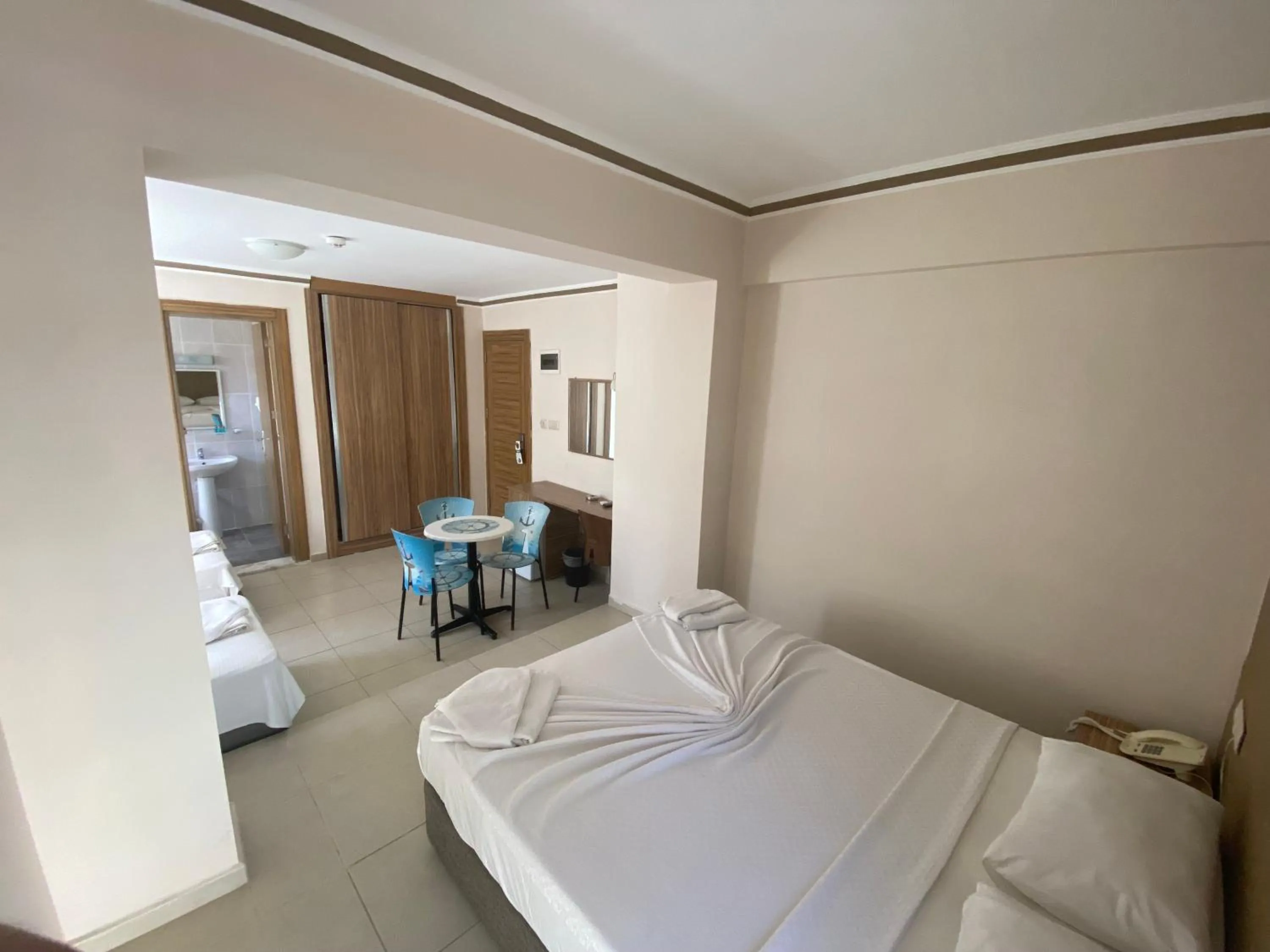 Bed in Astoria Beach Hotel