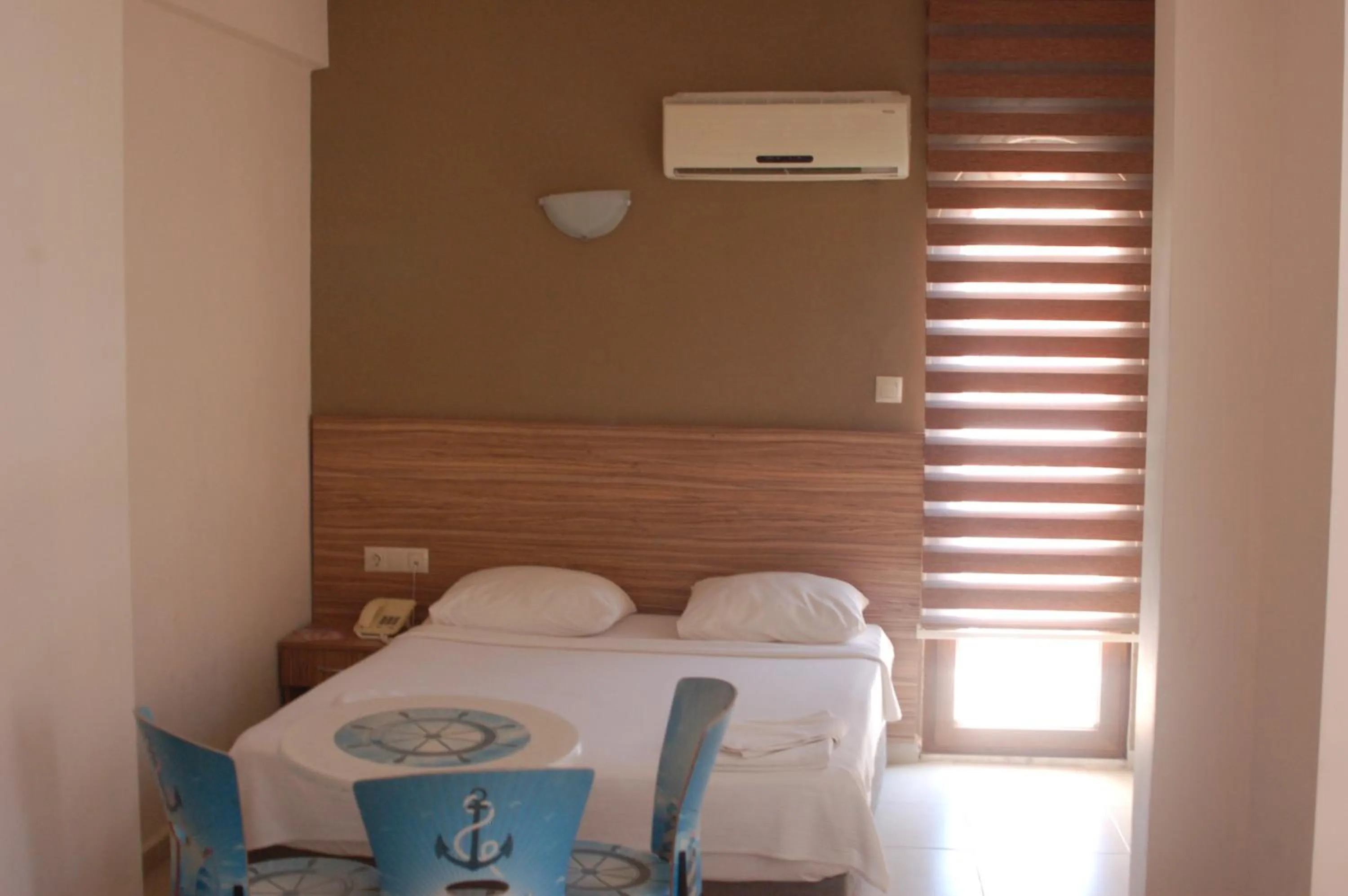 Bed in Astoria Beach Hotel