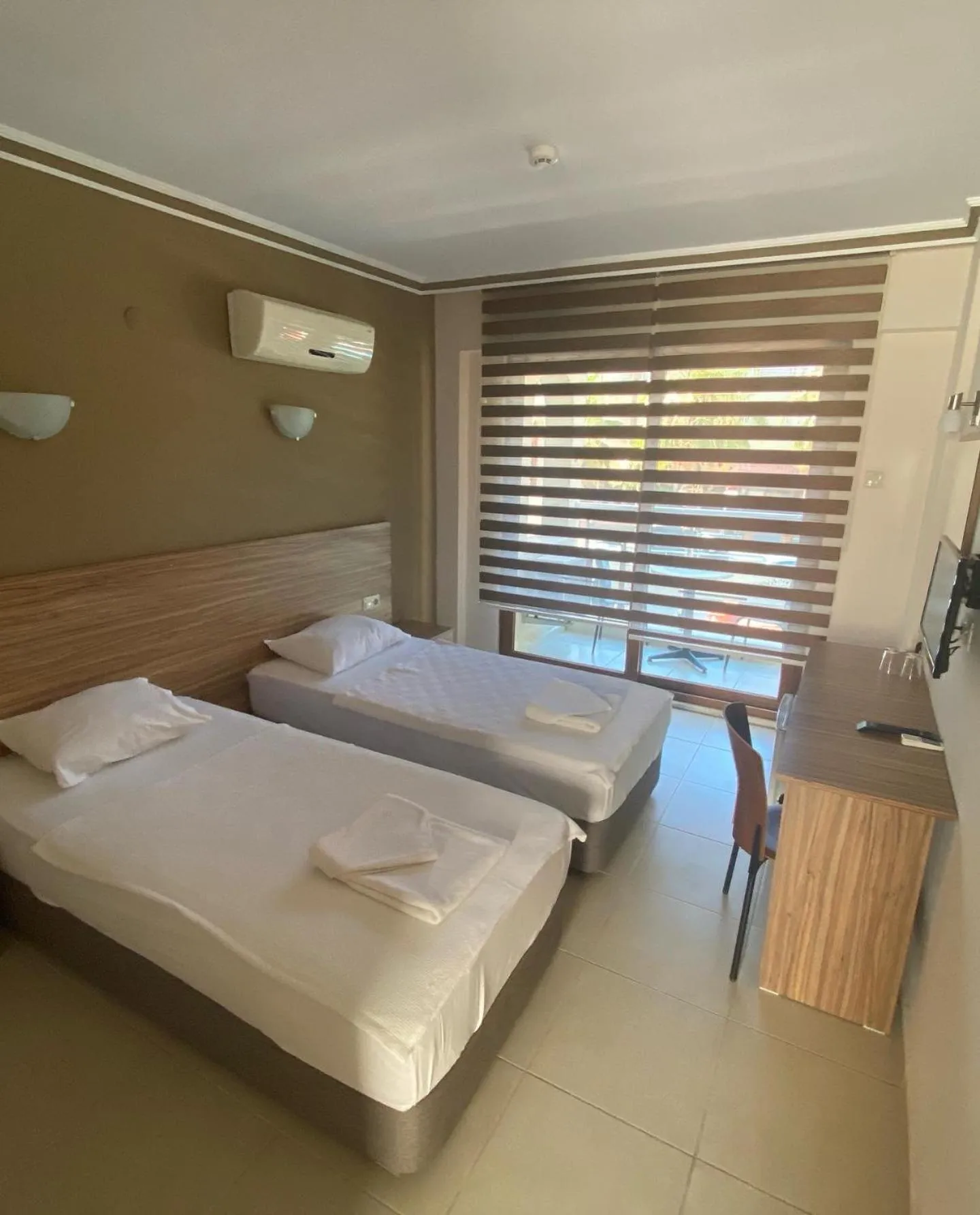 Bed in Astoria Beach Hotel