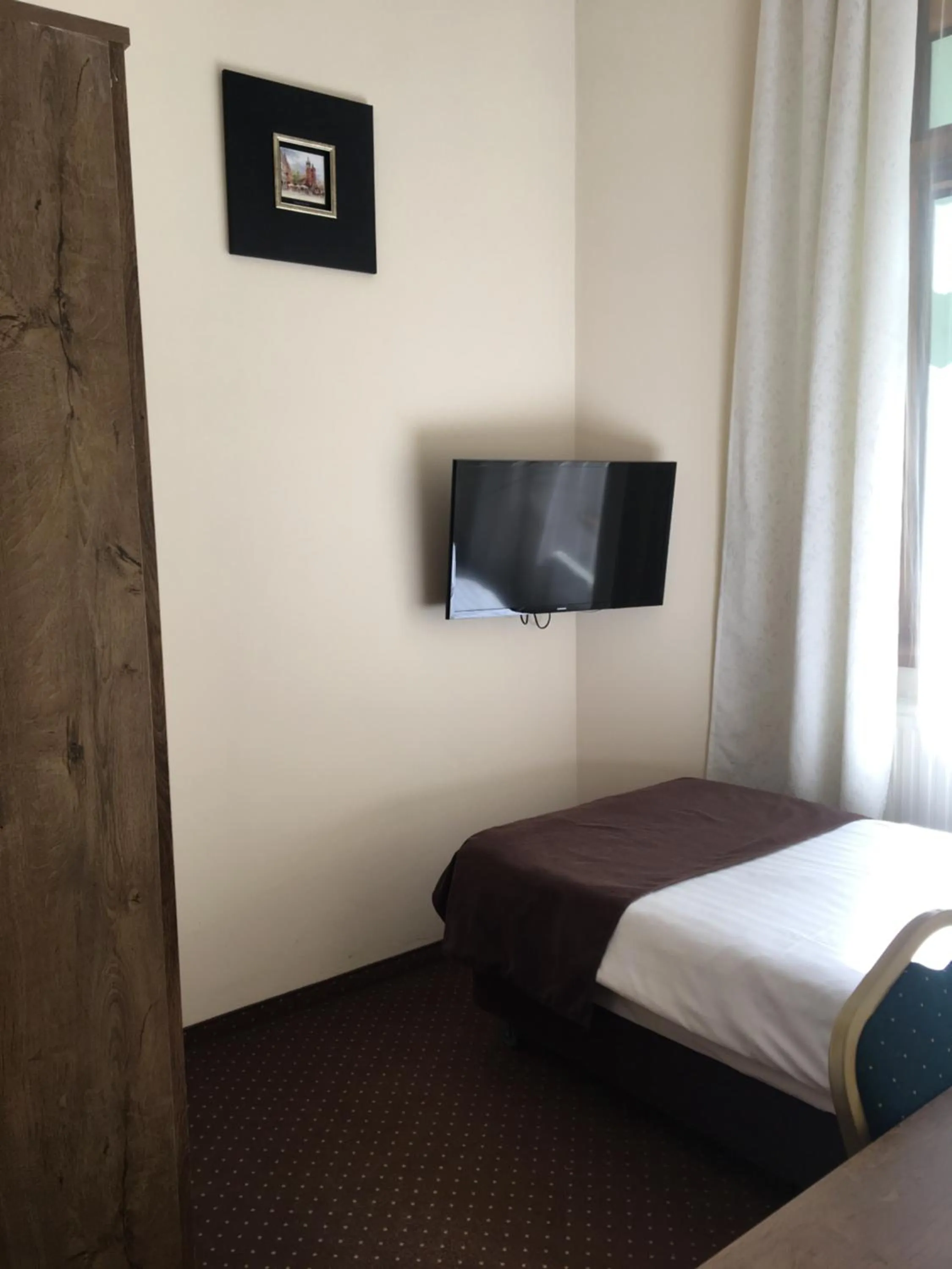 Bed in Matejko Hotel