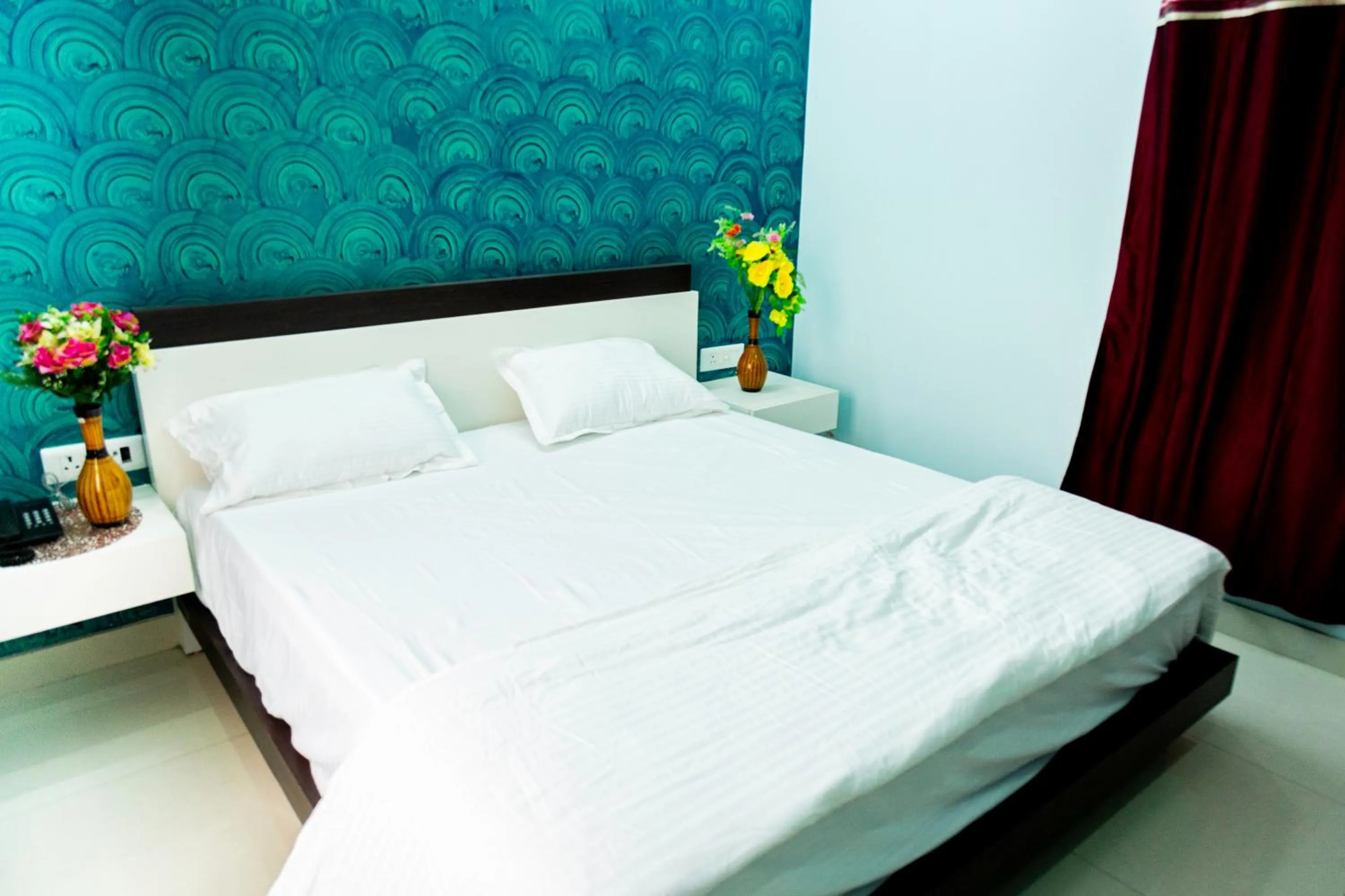 Bed in Jagdambey Hotel