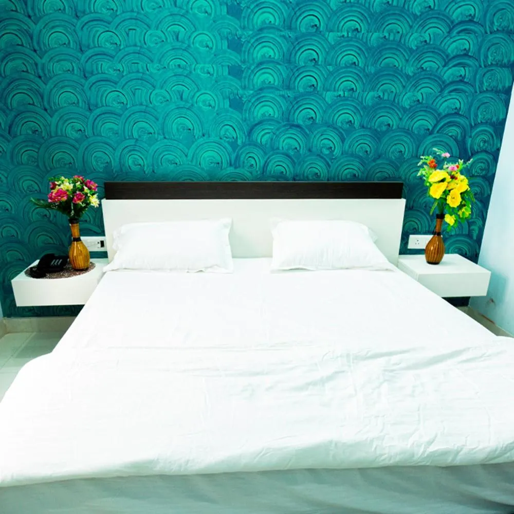 Bed in Jagdambey Hotel