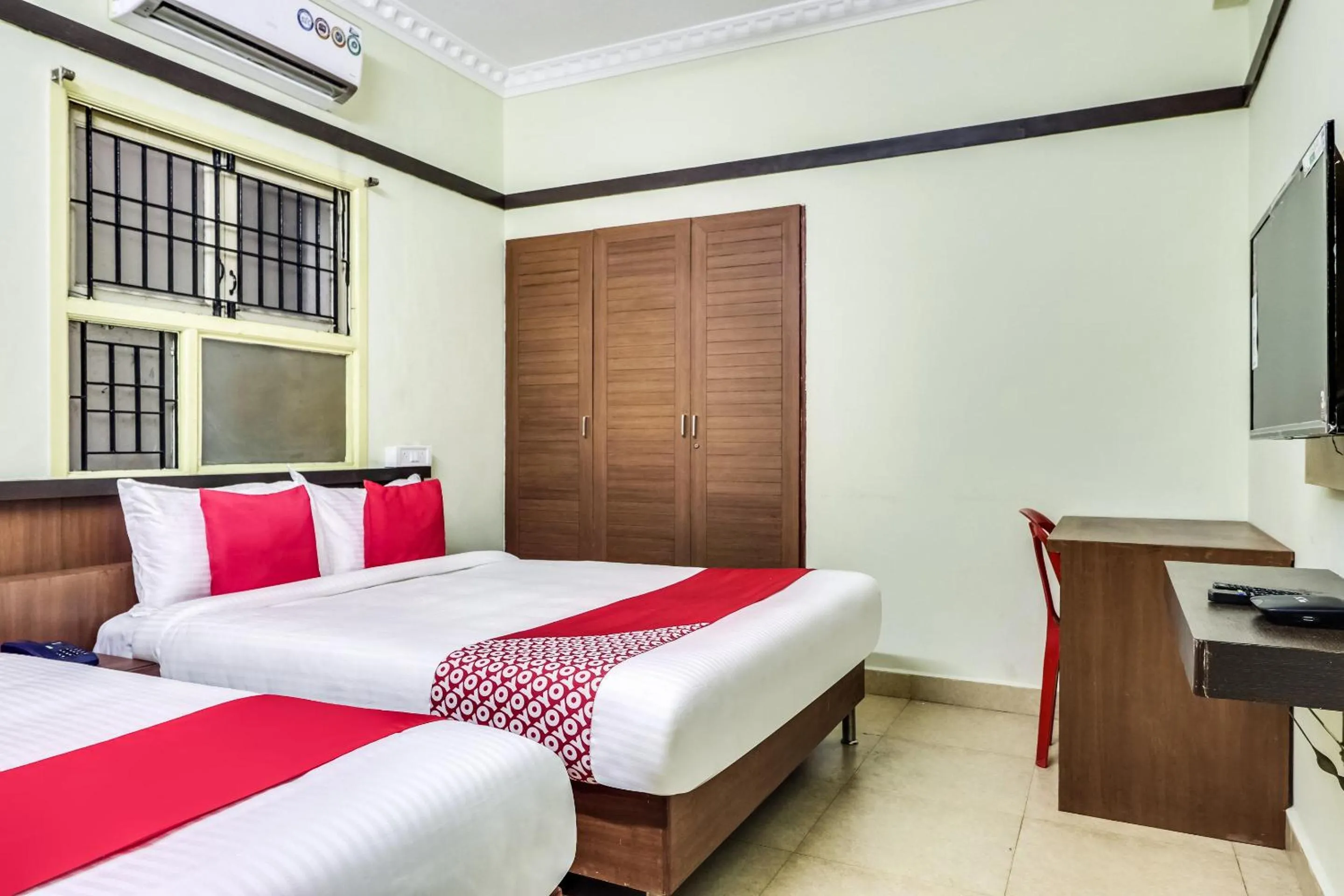 Bedroom in Hotel O Elite Residency