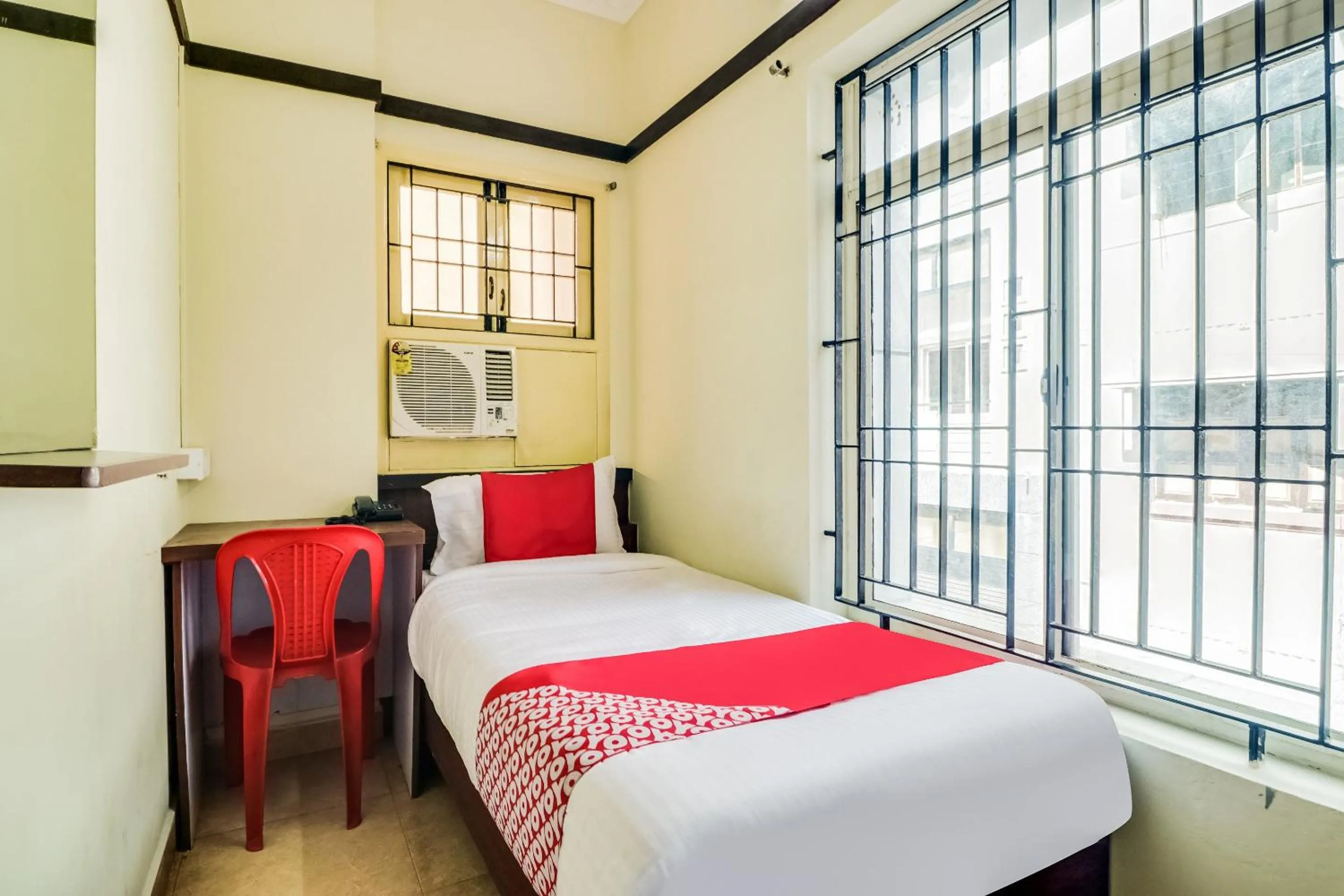 Bedroom in Hotel O Elite Residency