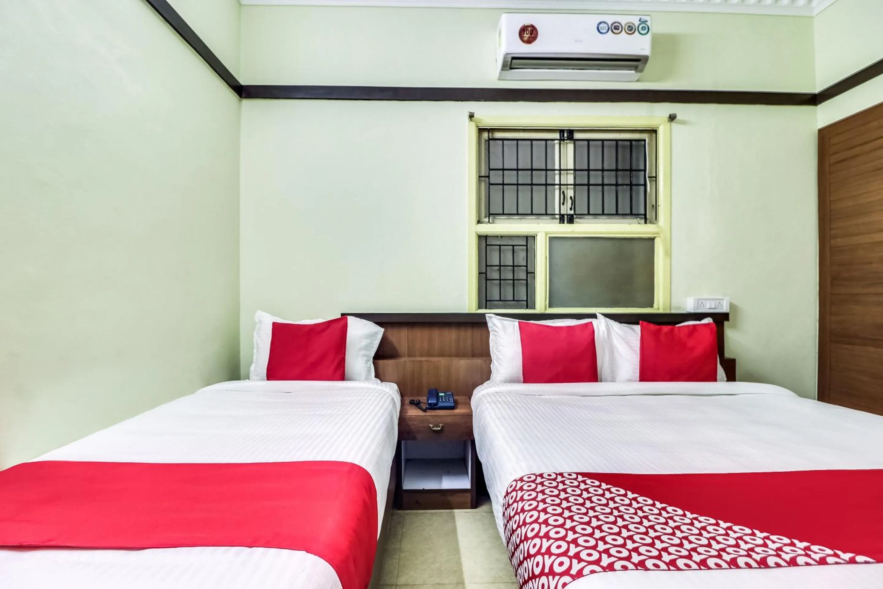 Bedroom in Hotel O Elite Residency