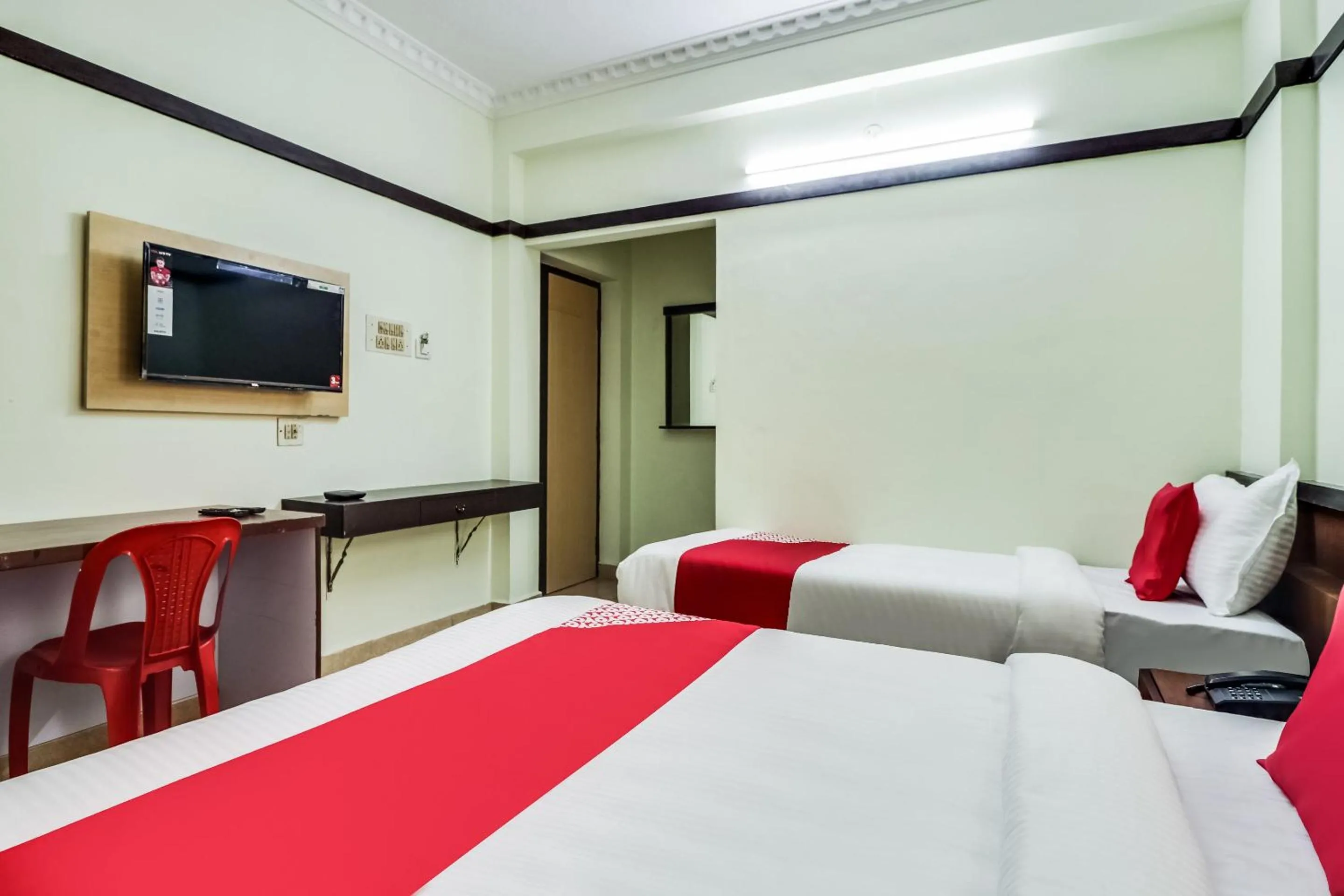 Bedroom in Hotel O Elite Residency