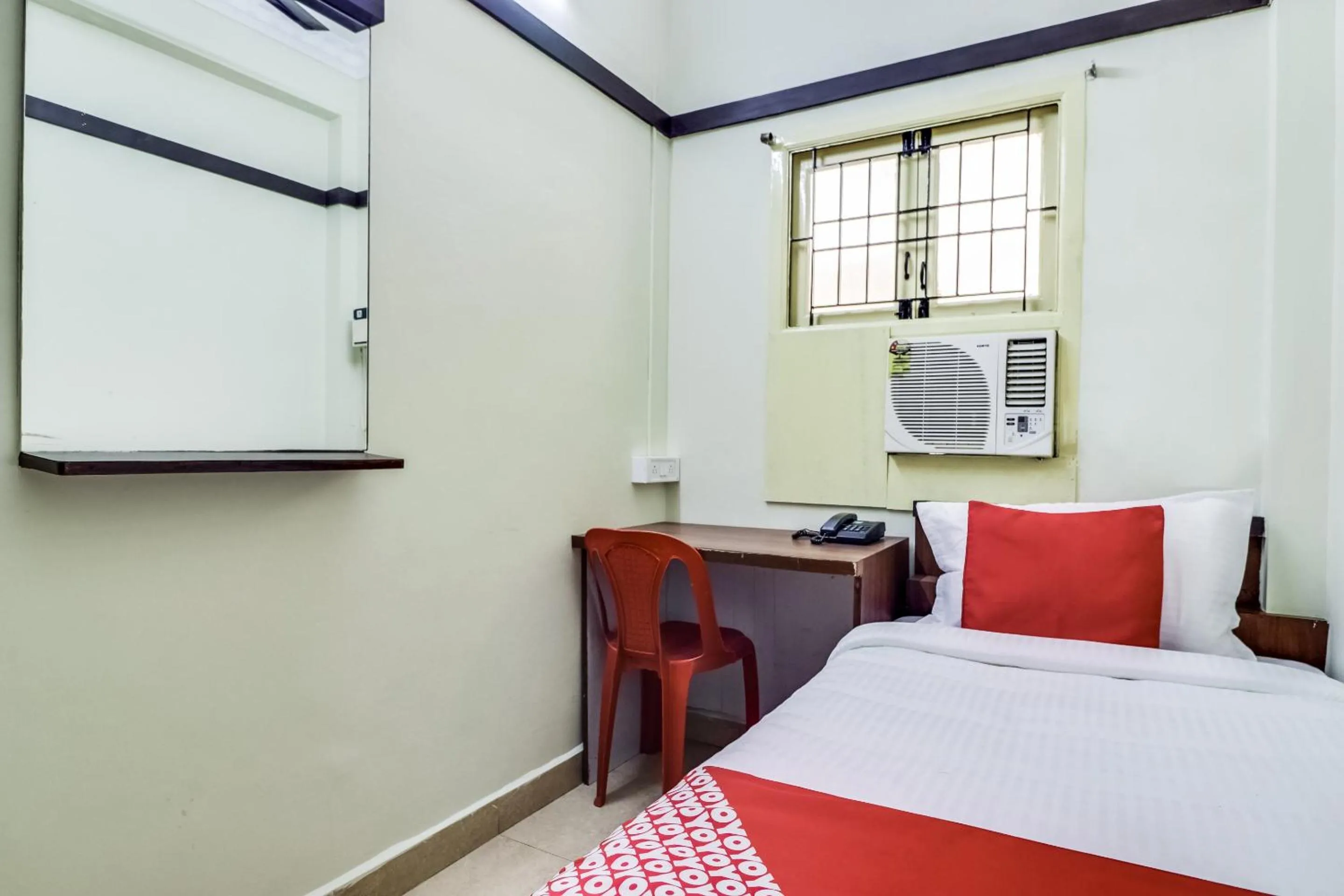 Bedroom in Hotel O Elite Residency