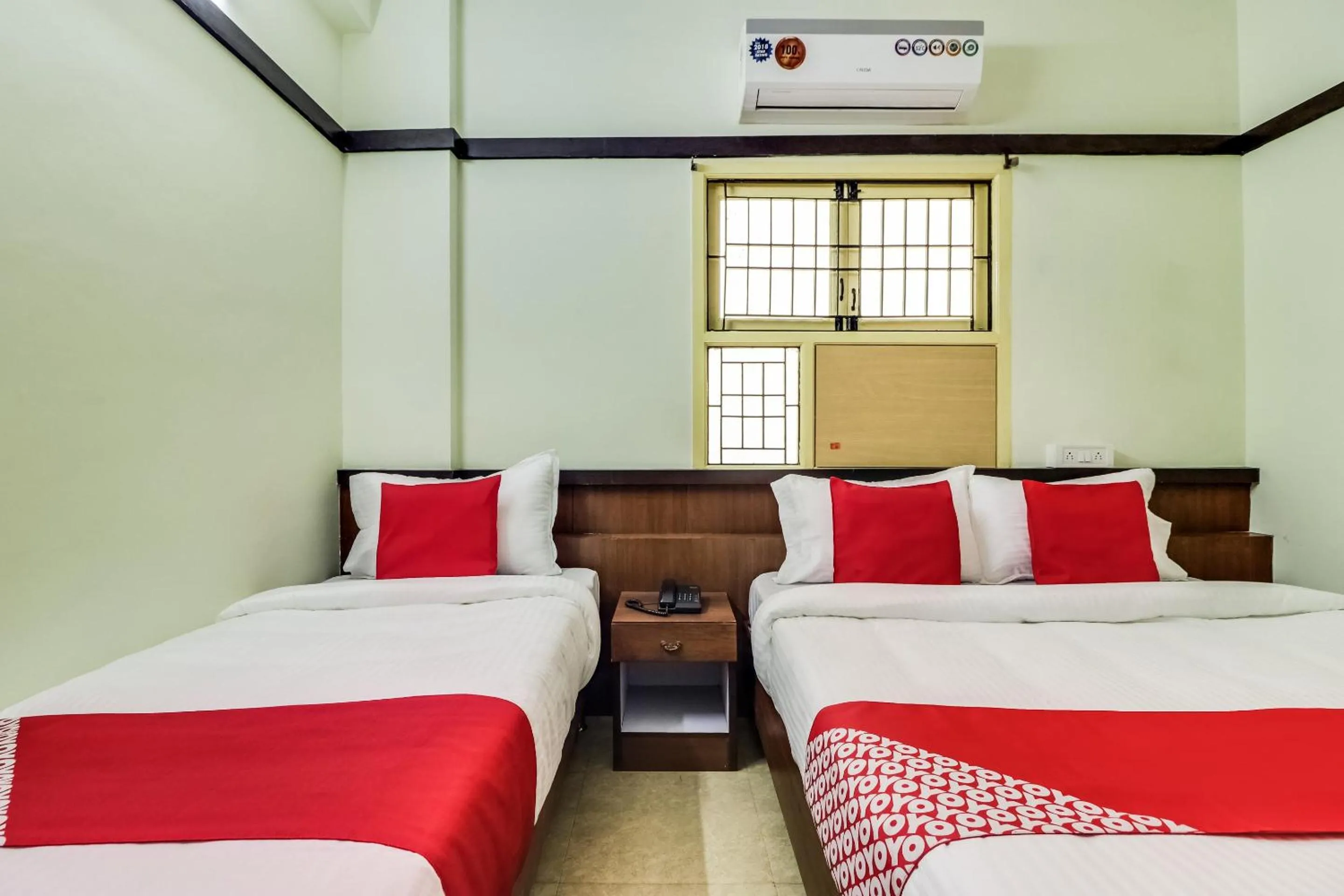 Bedroom in Hotel O Elite Residency