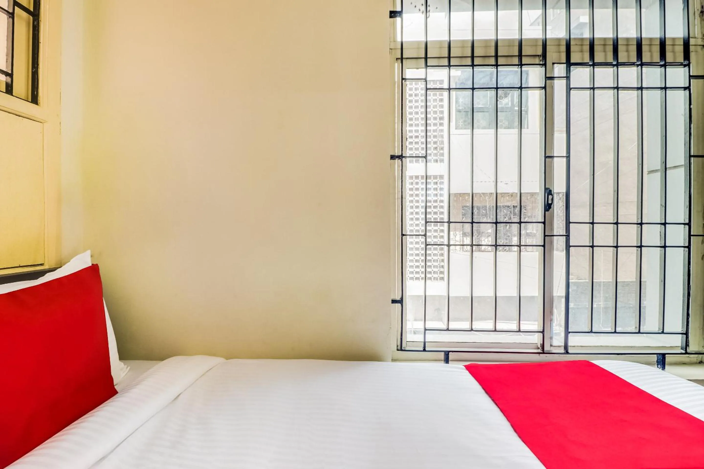 Bedroom in Hotel O Elite Residency