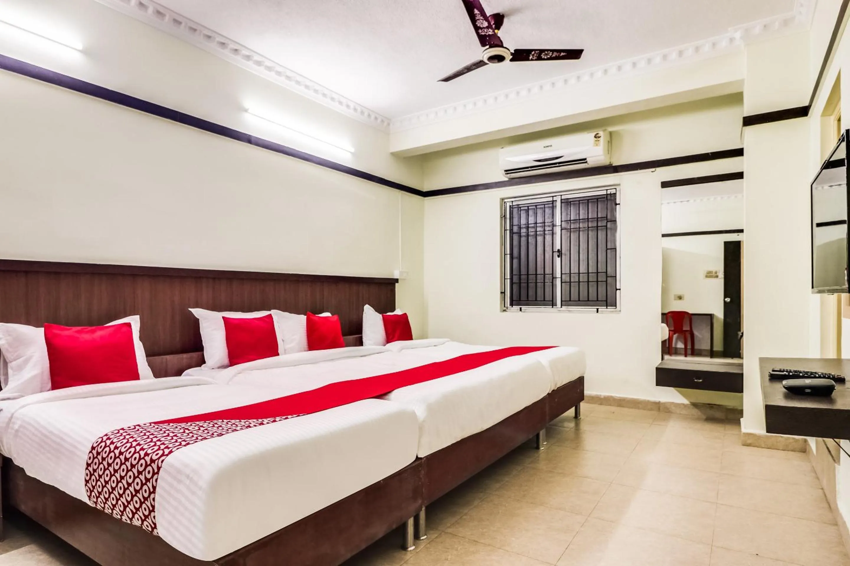 Bedroom in Hotel O Elite Residency