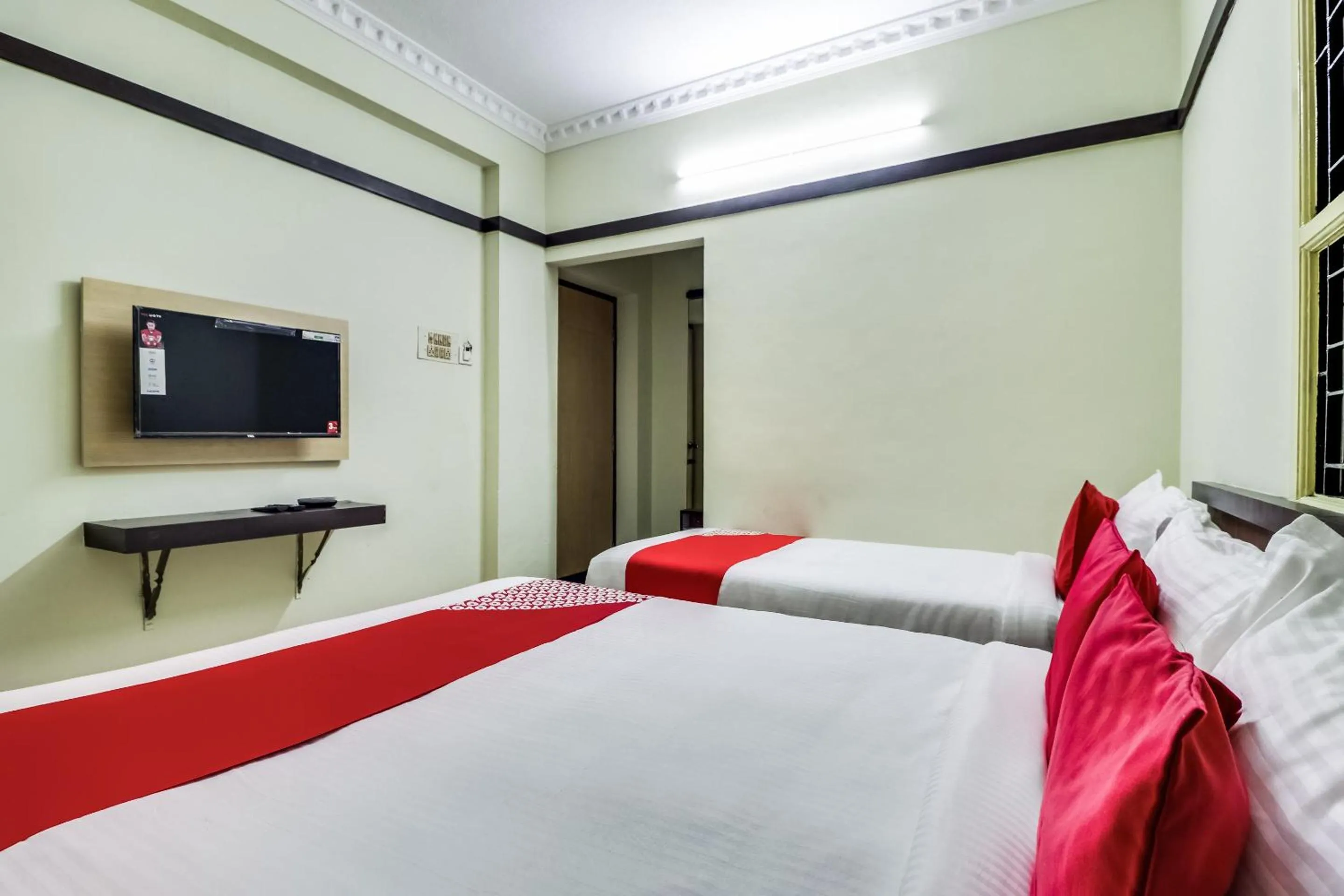 Bedroom in Hotel O Elite Residency