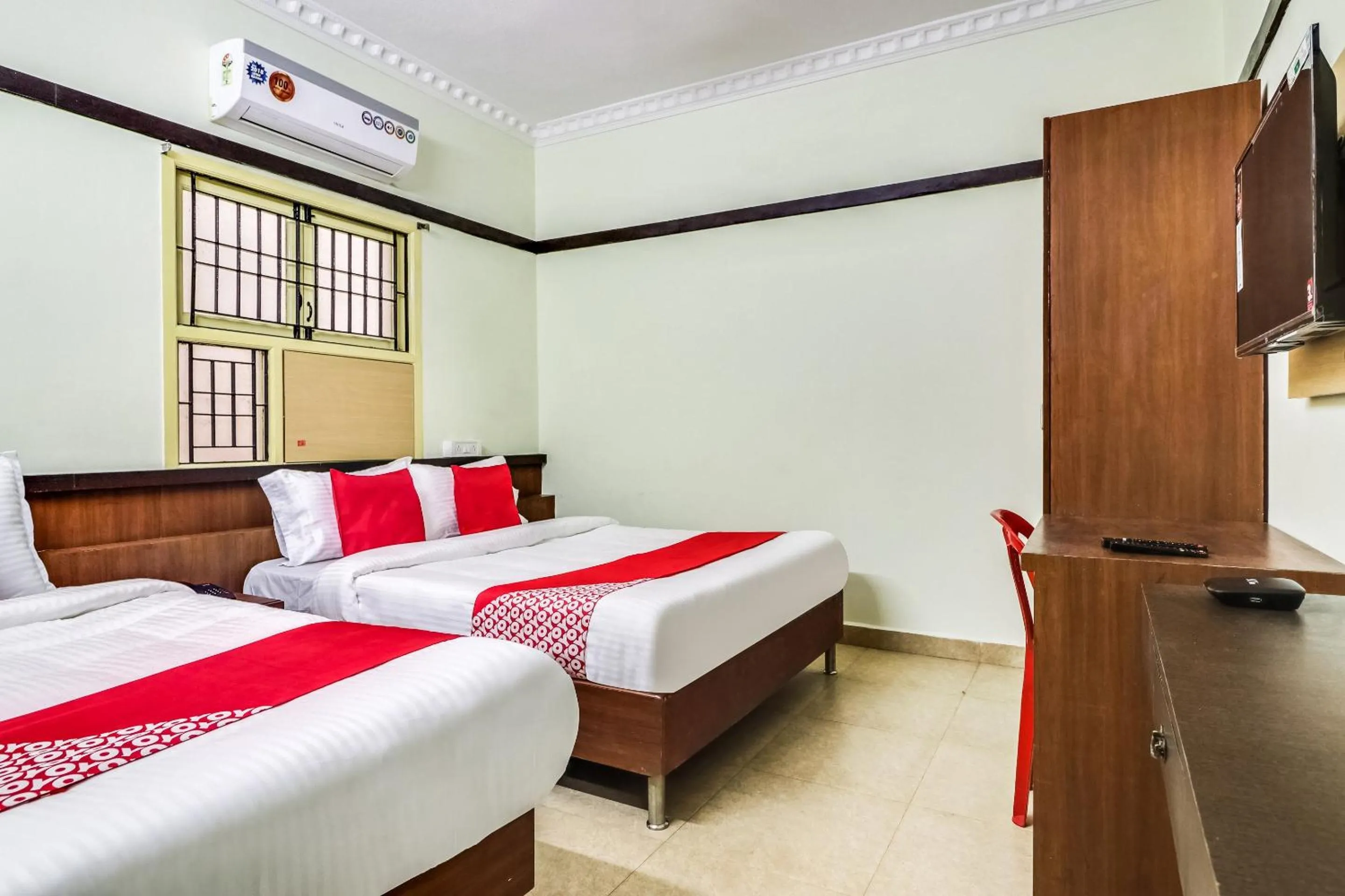 Bedroom in Hotel O Elite Residency