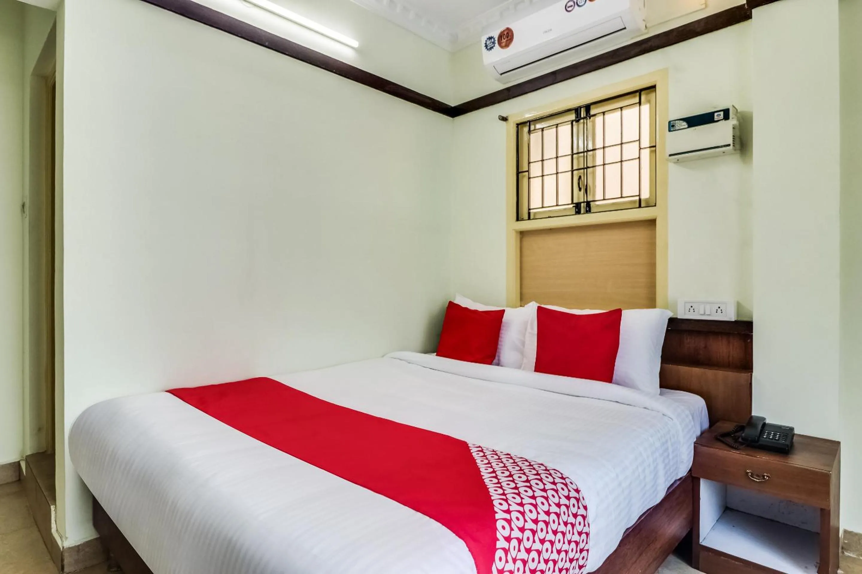 Bedroom in Hotel O Elite Residency