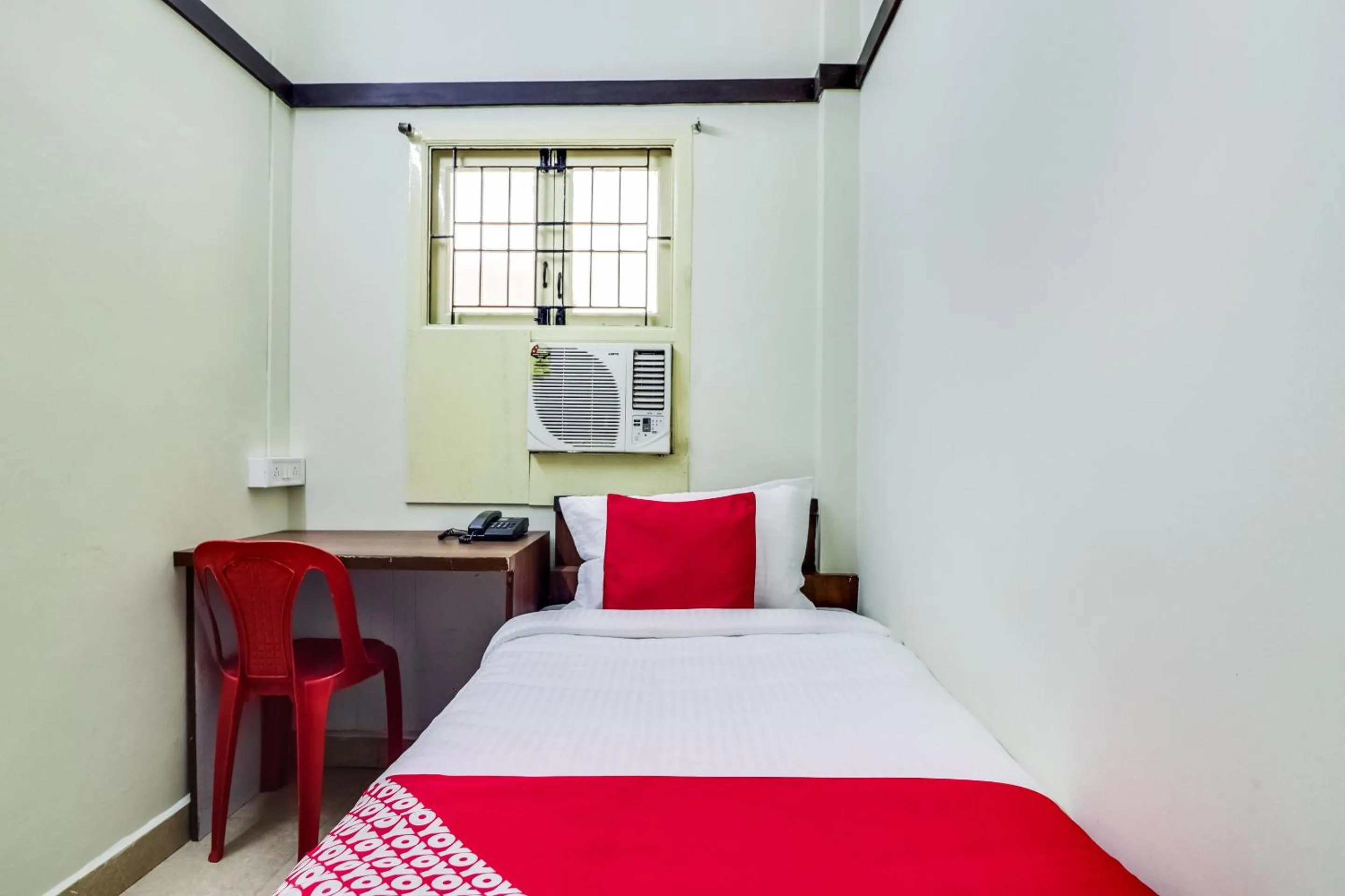 Bedroom in Hotel O Elite Residency