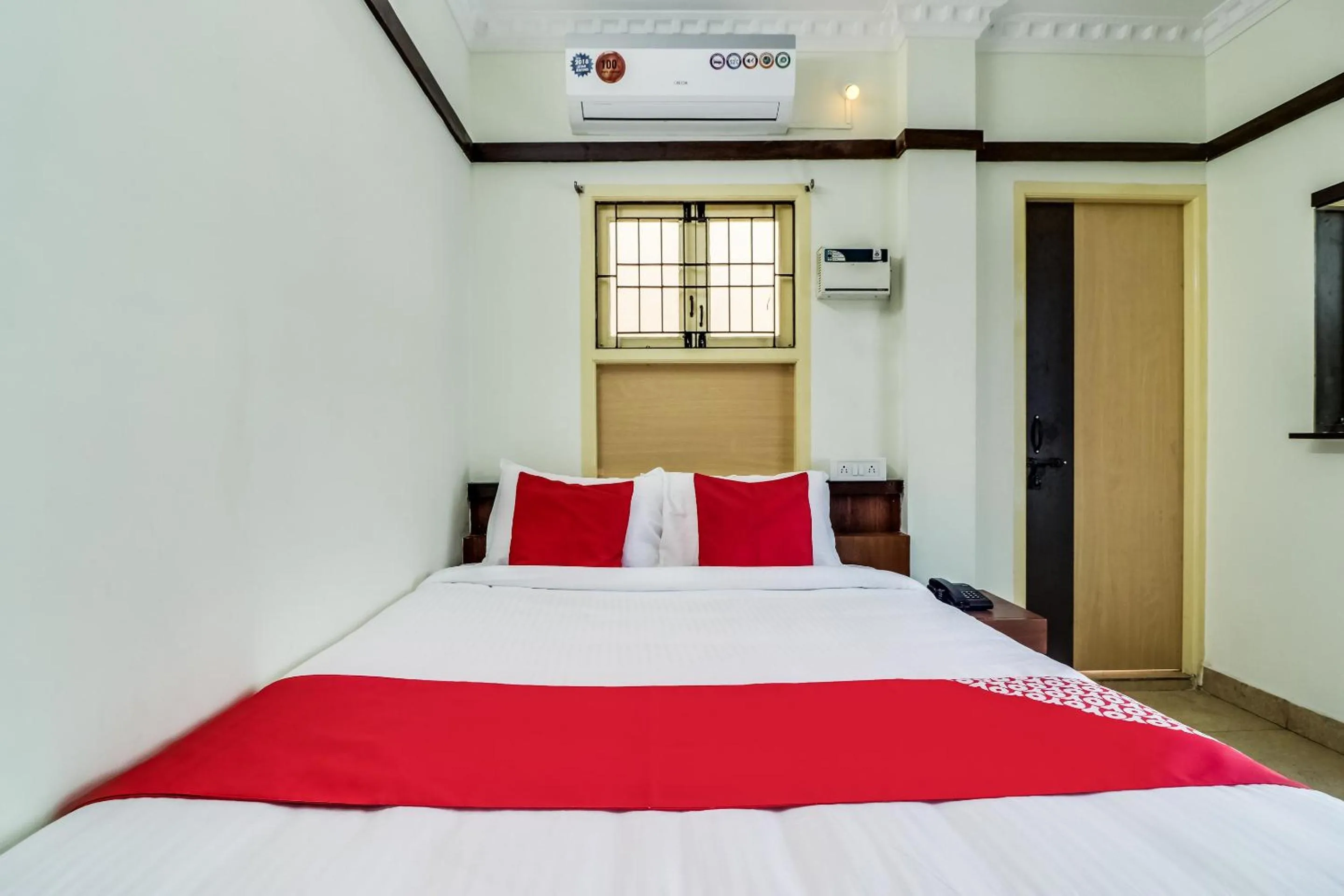 Bedroom in Hotel O Elite Residency