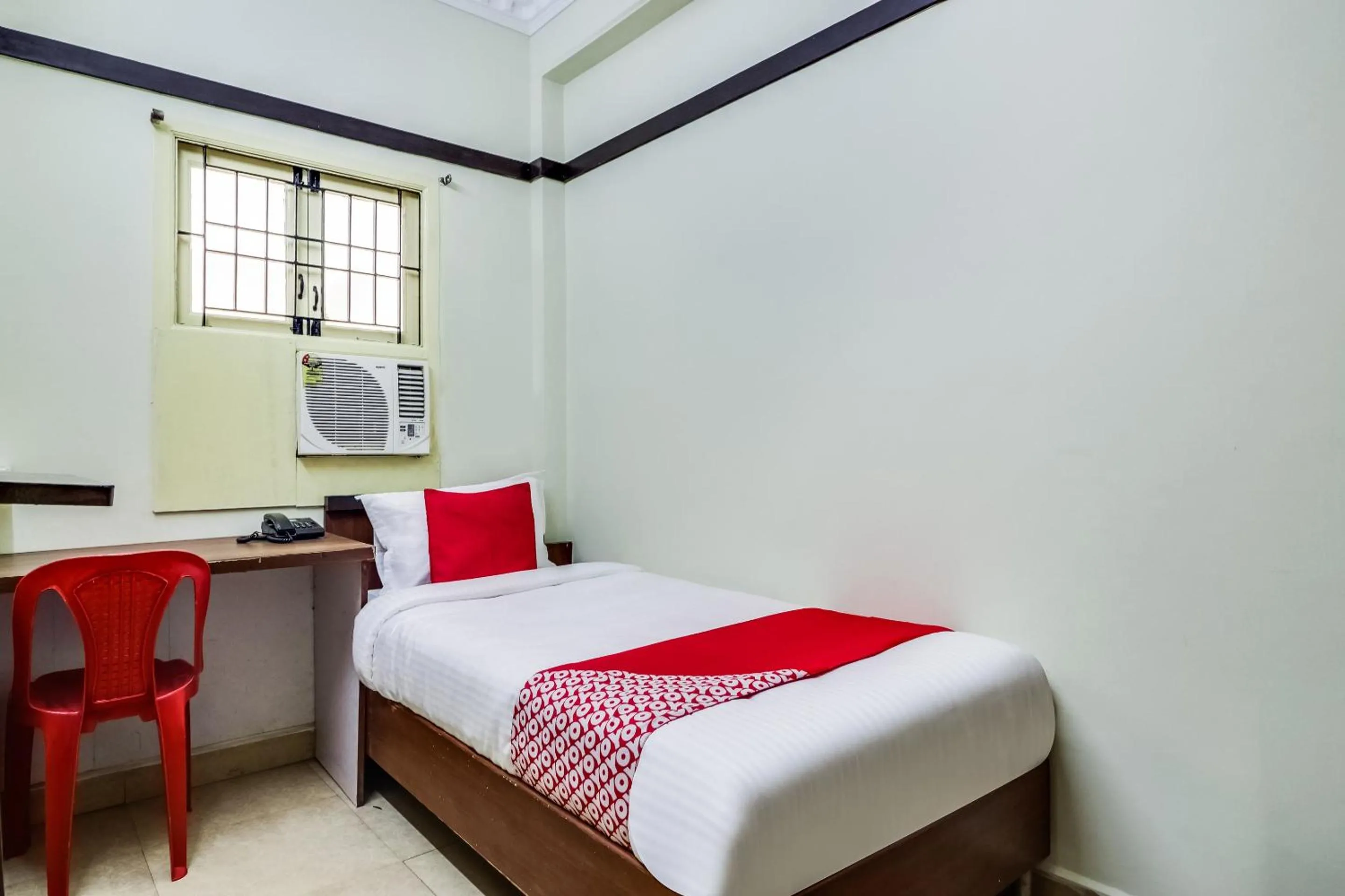 Bedroom in Hotel O Elite Residency