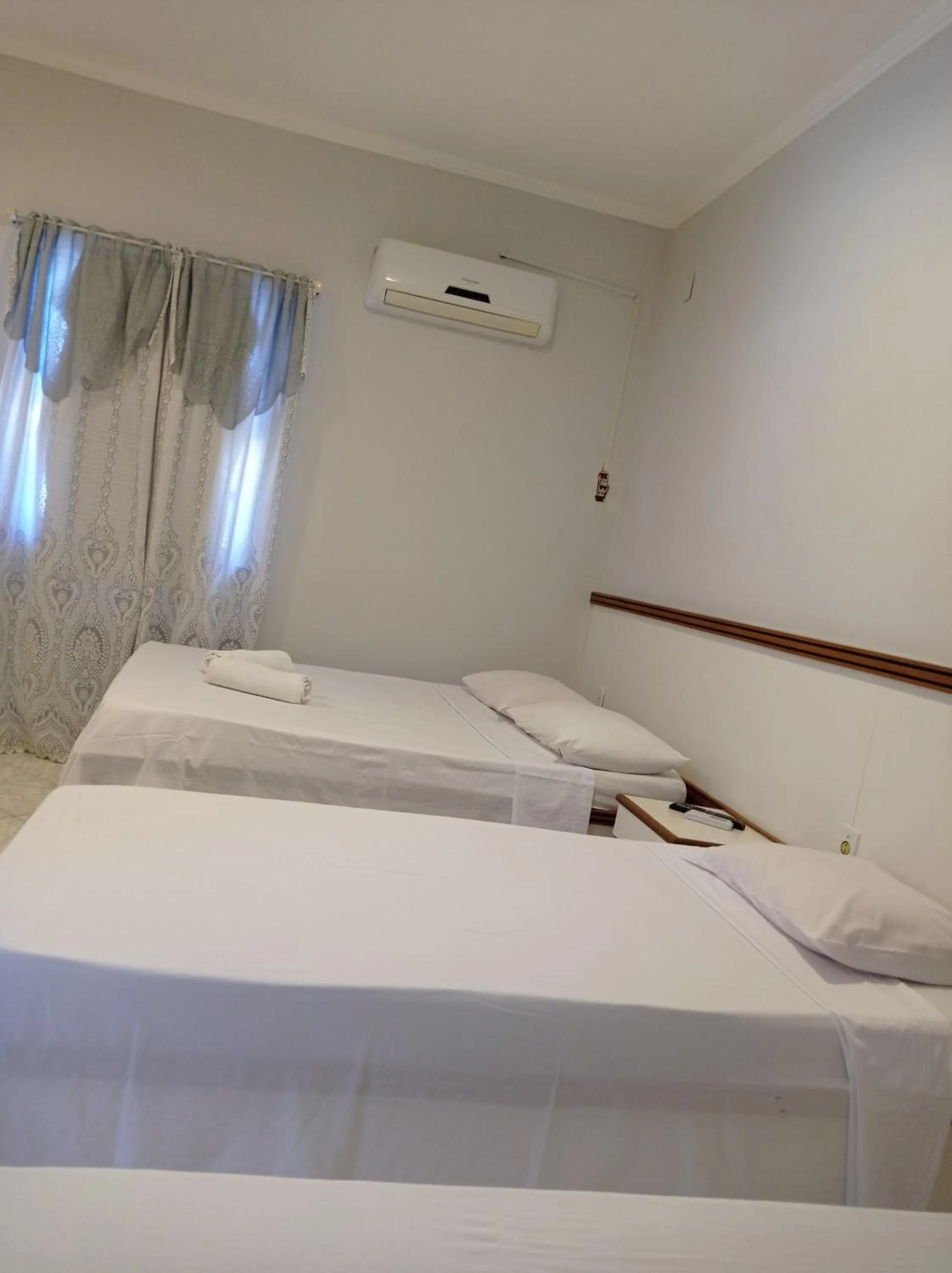 Bed in Pousada Aruamar