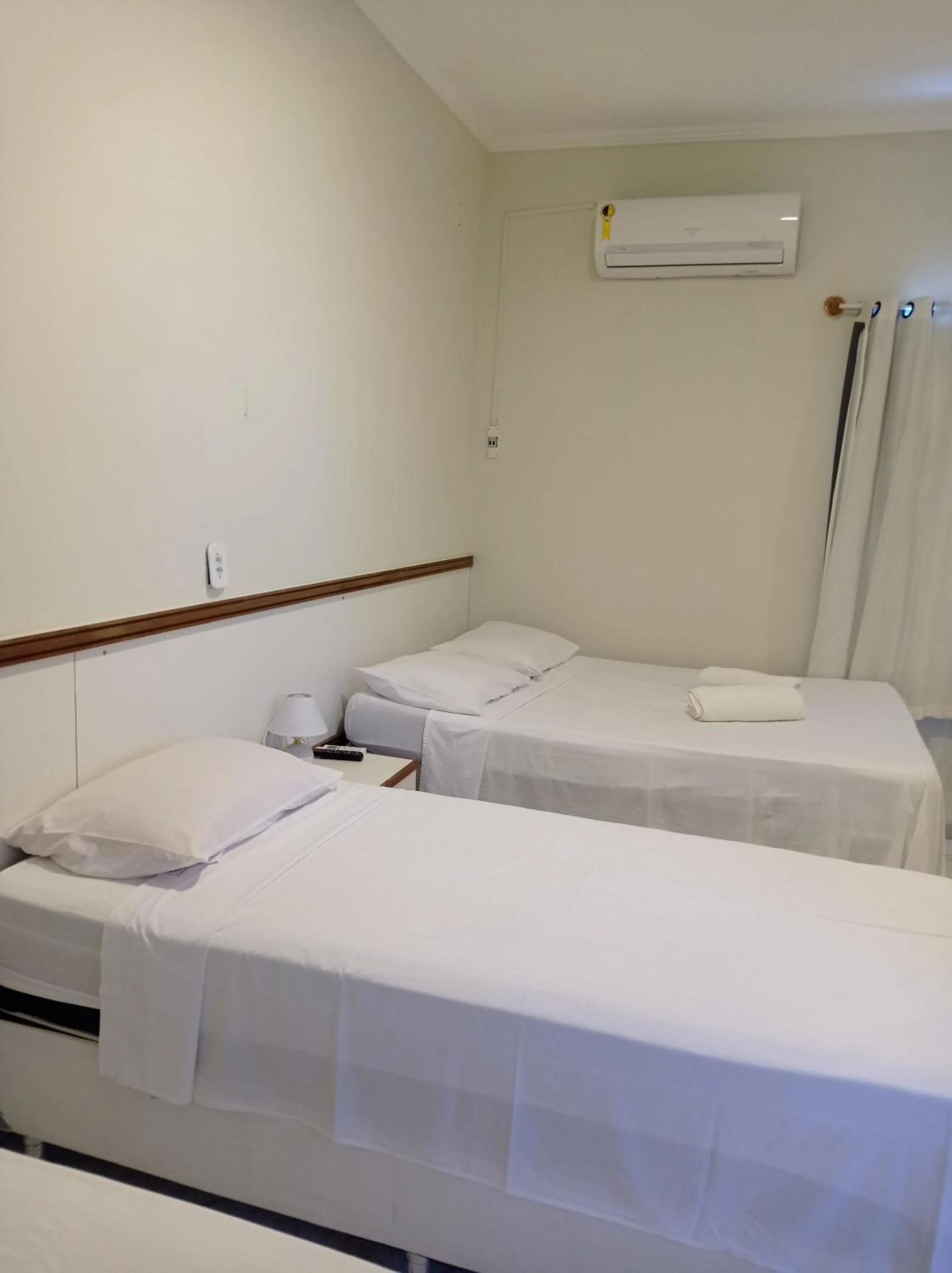 Bed in Pousada Aruamar