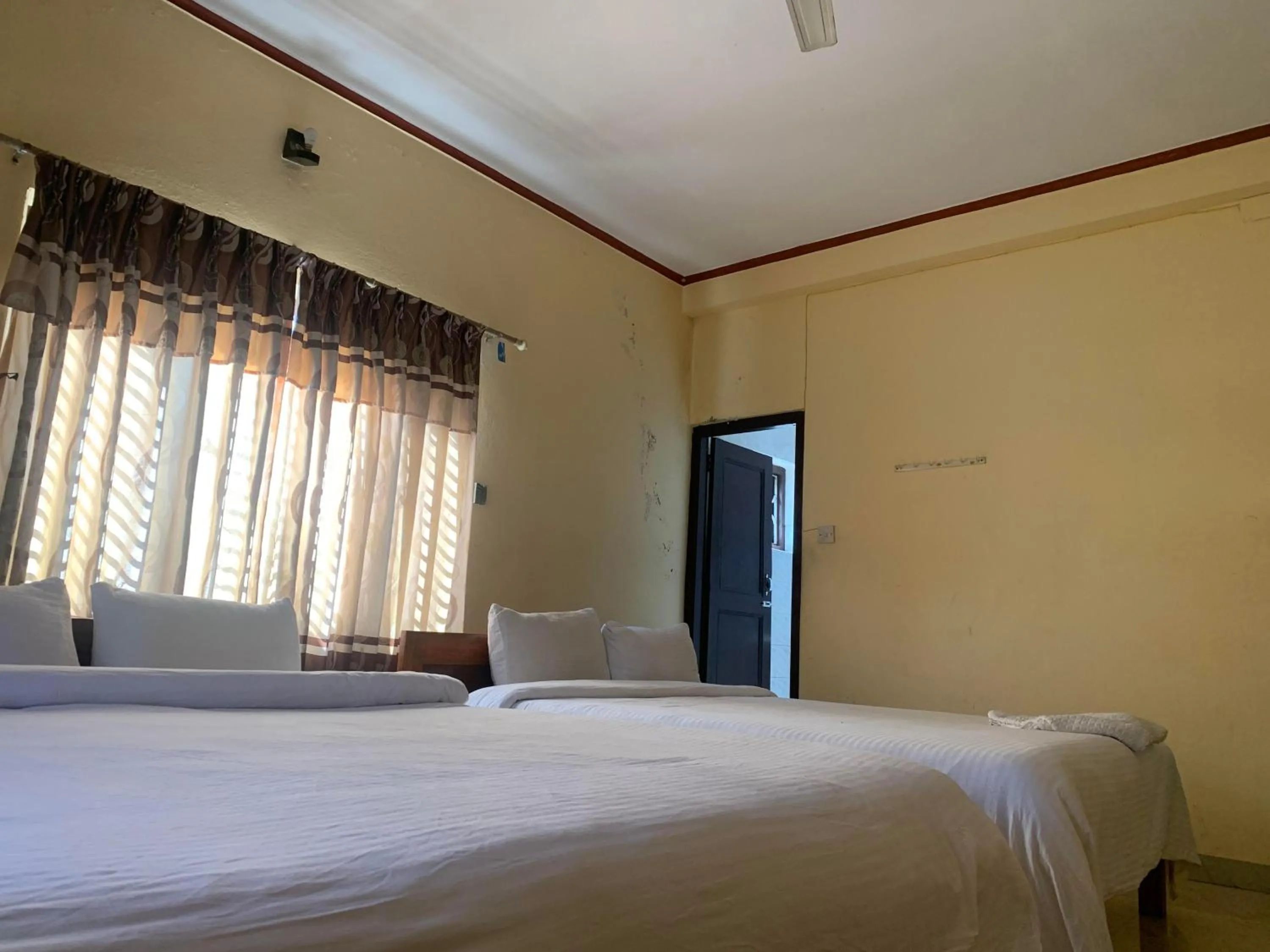 Bed in Hotel Peace Ganga Inn
