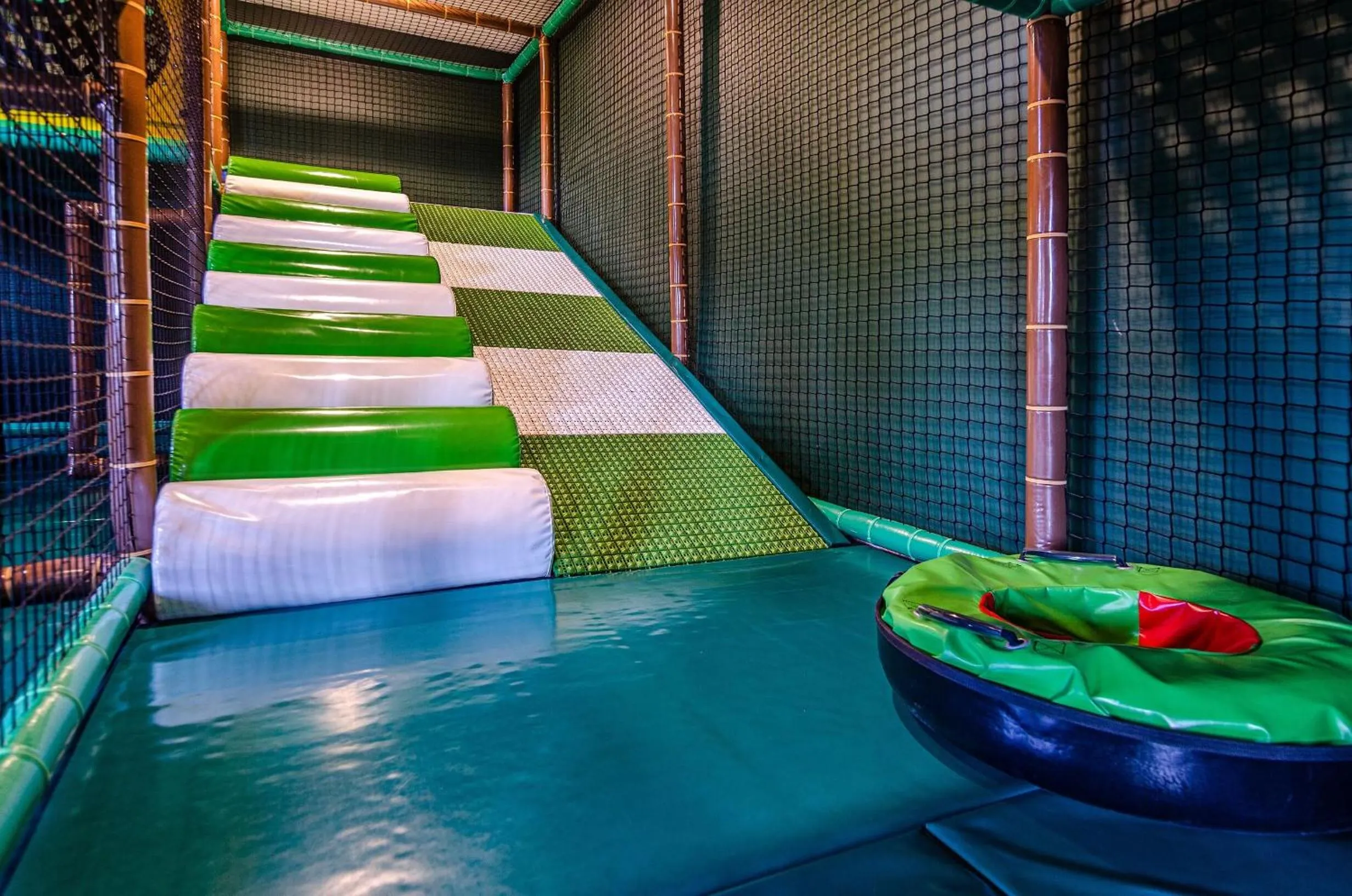 Children play ground, Bed in Hotel Astor