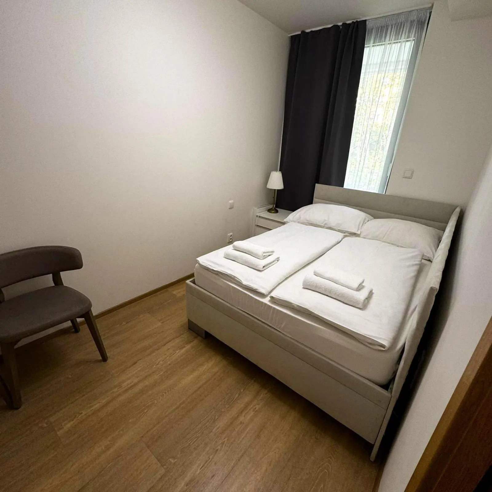 Bed in Kora Apartments