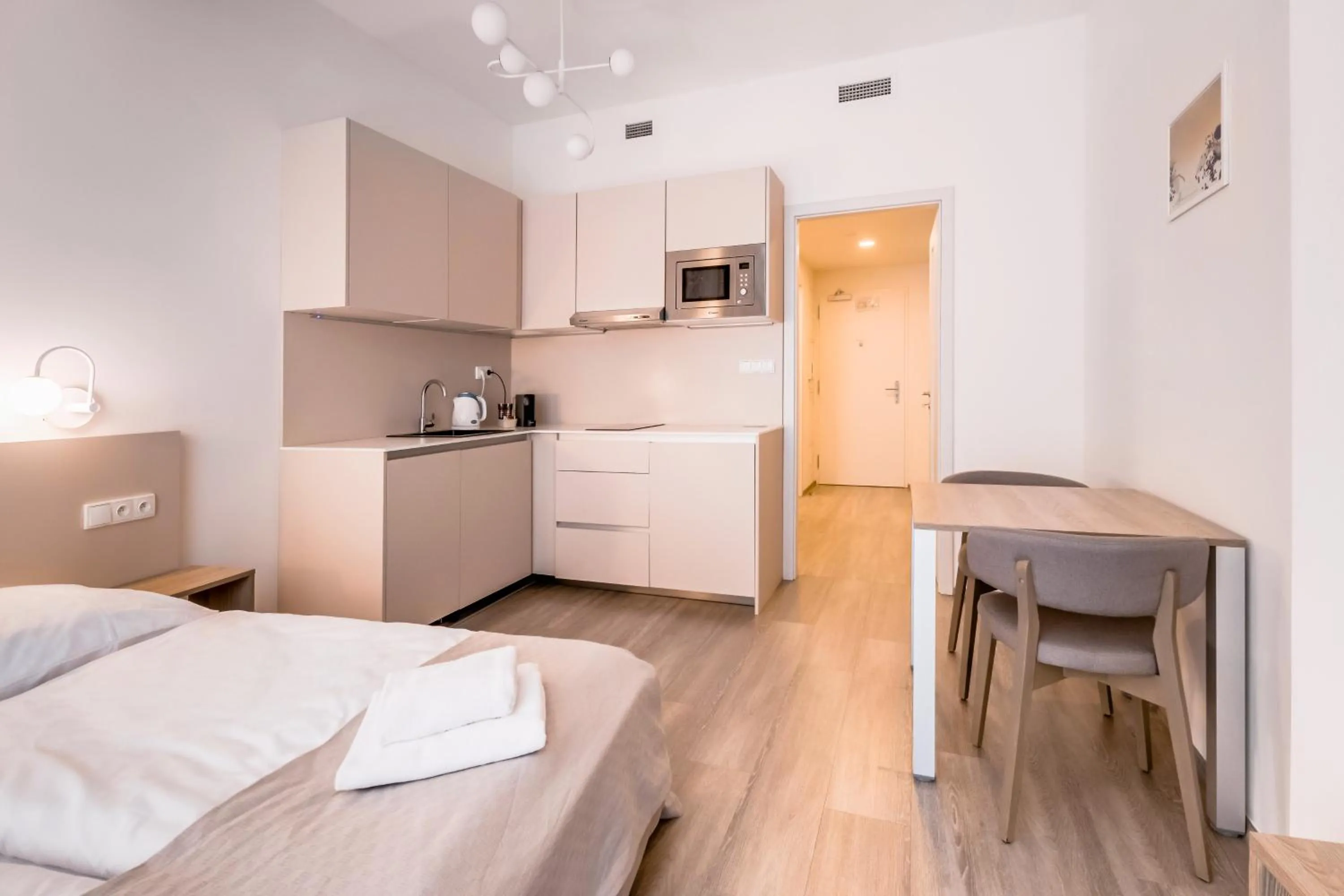 Kitchen or kitchenette, Bed in Kora Apartments