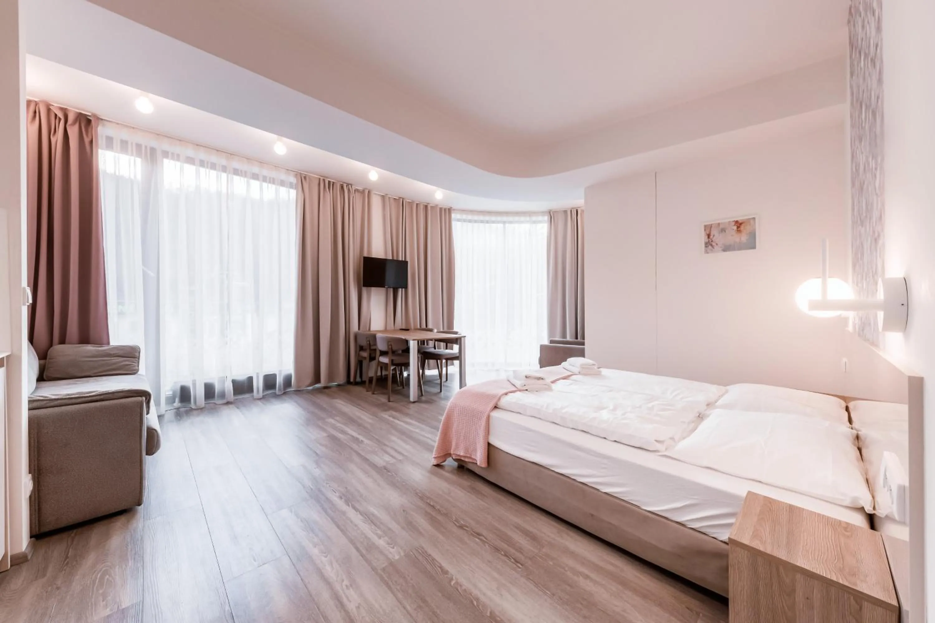 Bed in Kora Apartments