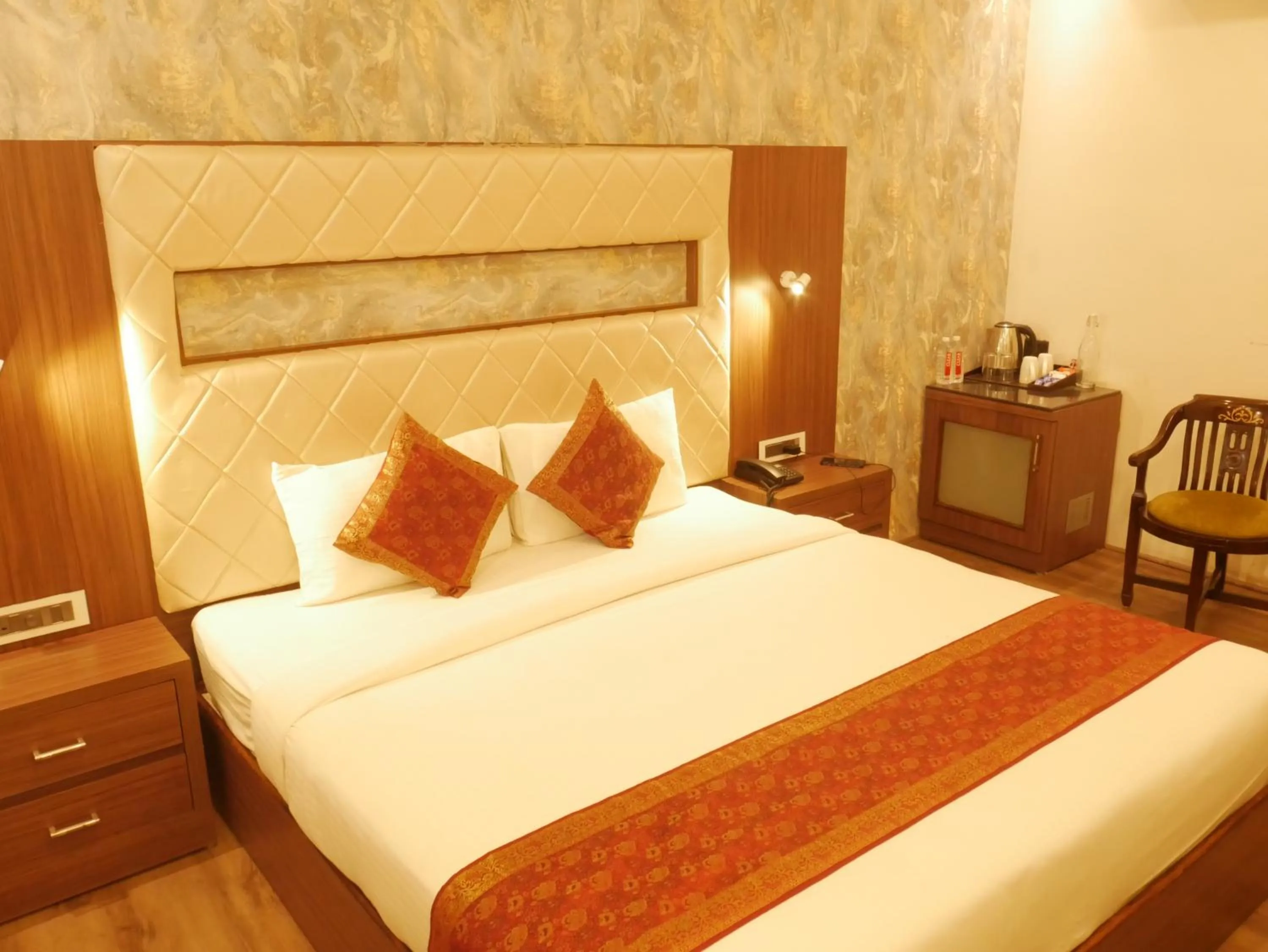 Bedroom in THE TRIUMPH HOTEL