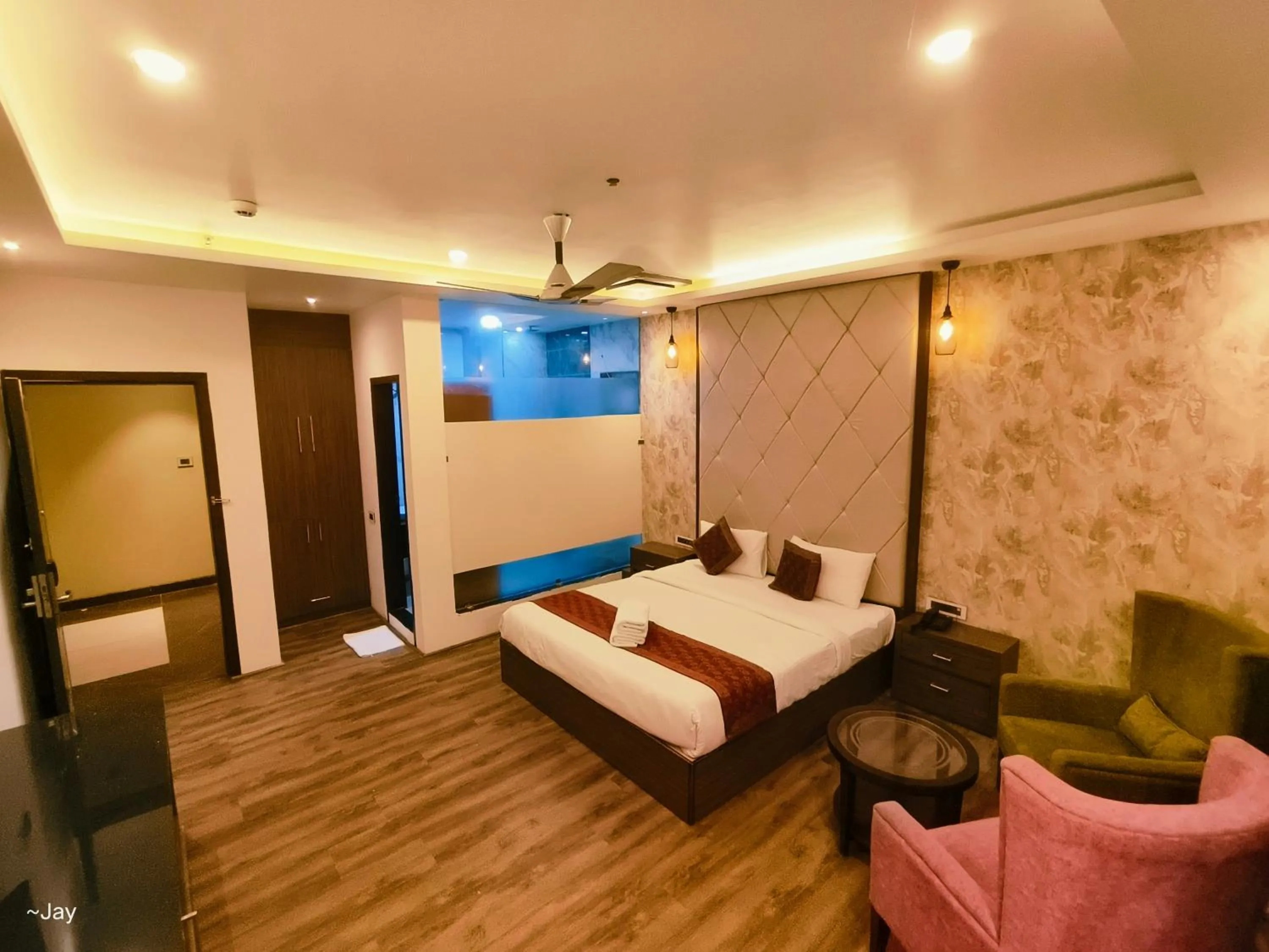 Bedroom in THE TRIUMPH HOTEL