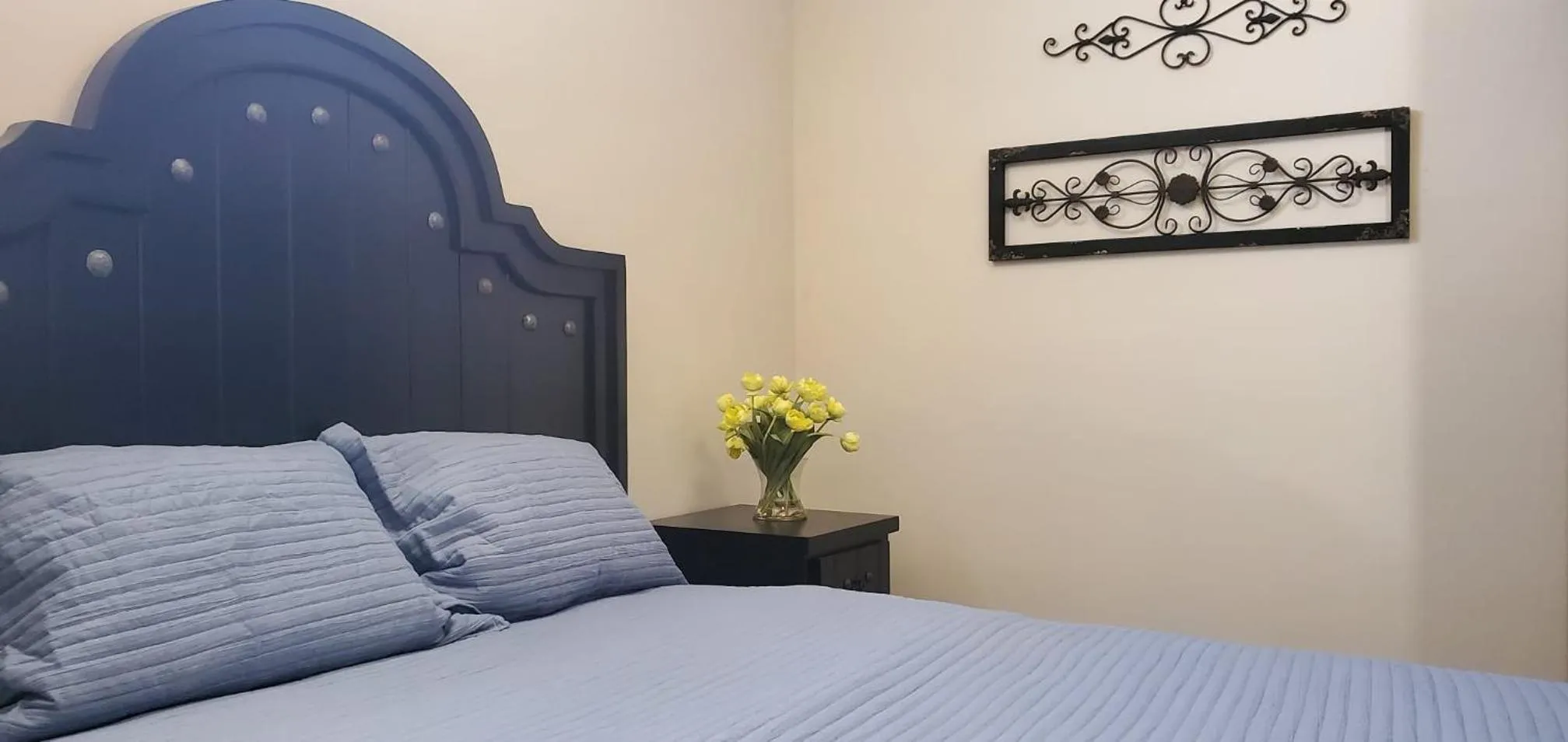 Bed in Playas Hotel Suites