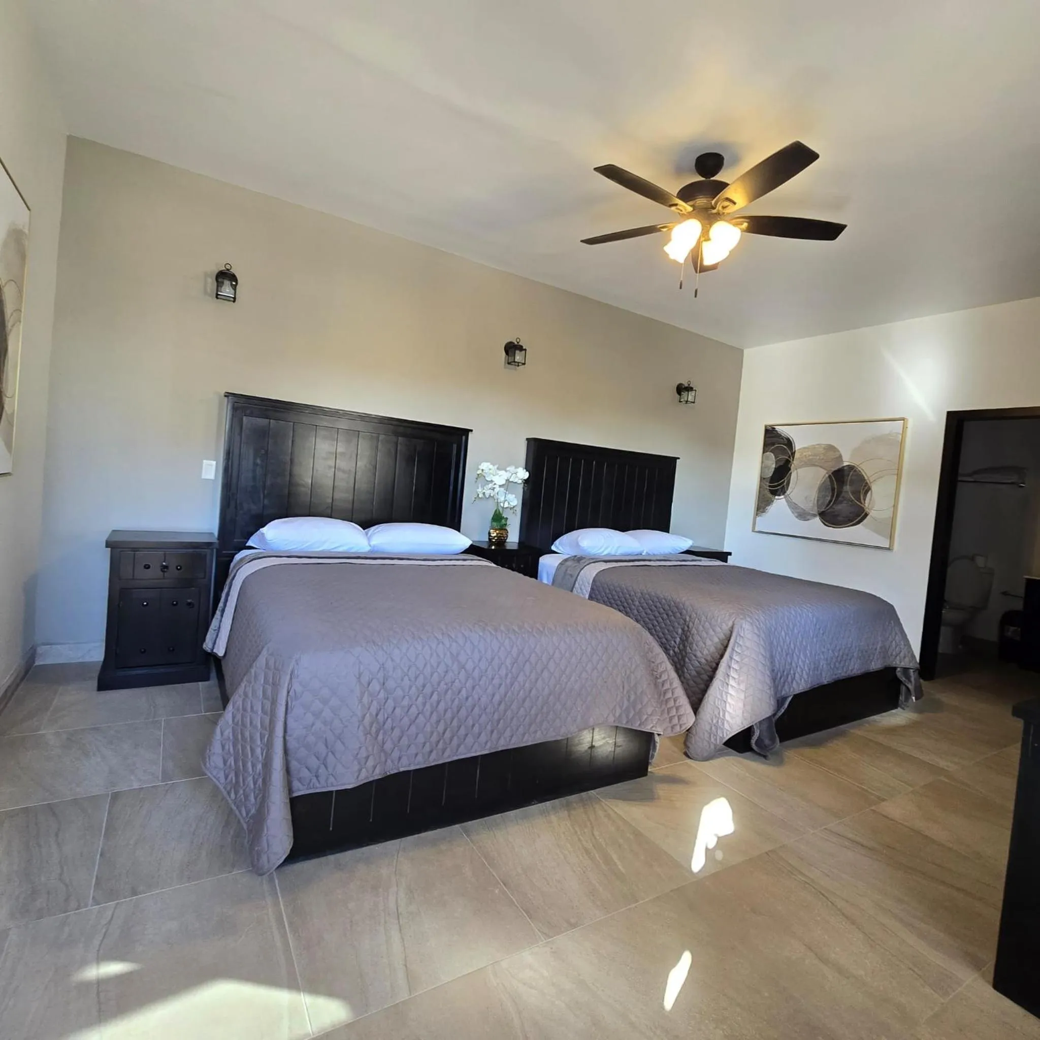 Bed in Playas Hotel Suites