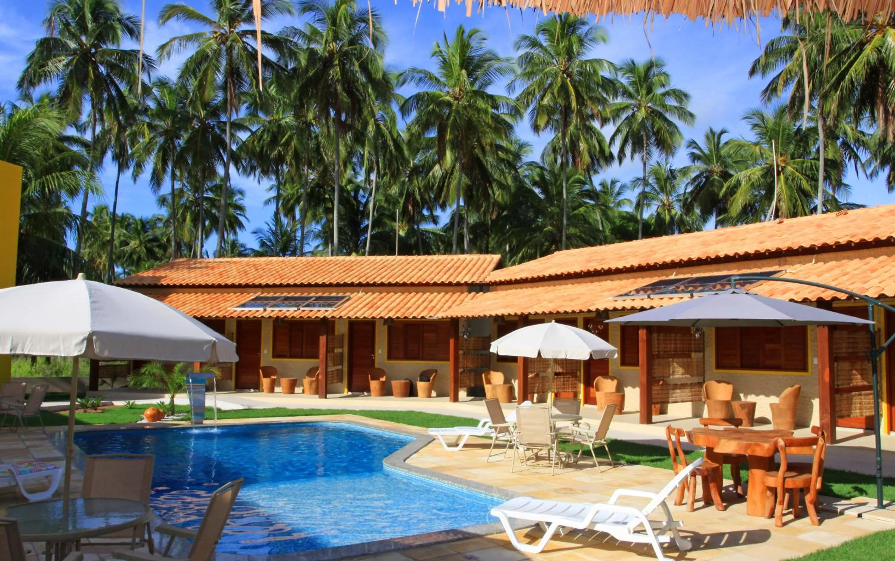 Swimming pool in Pousada Yapara-Tyba