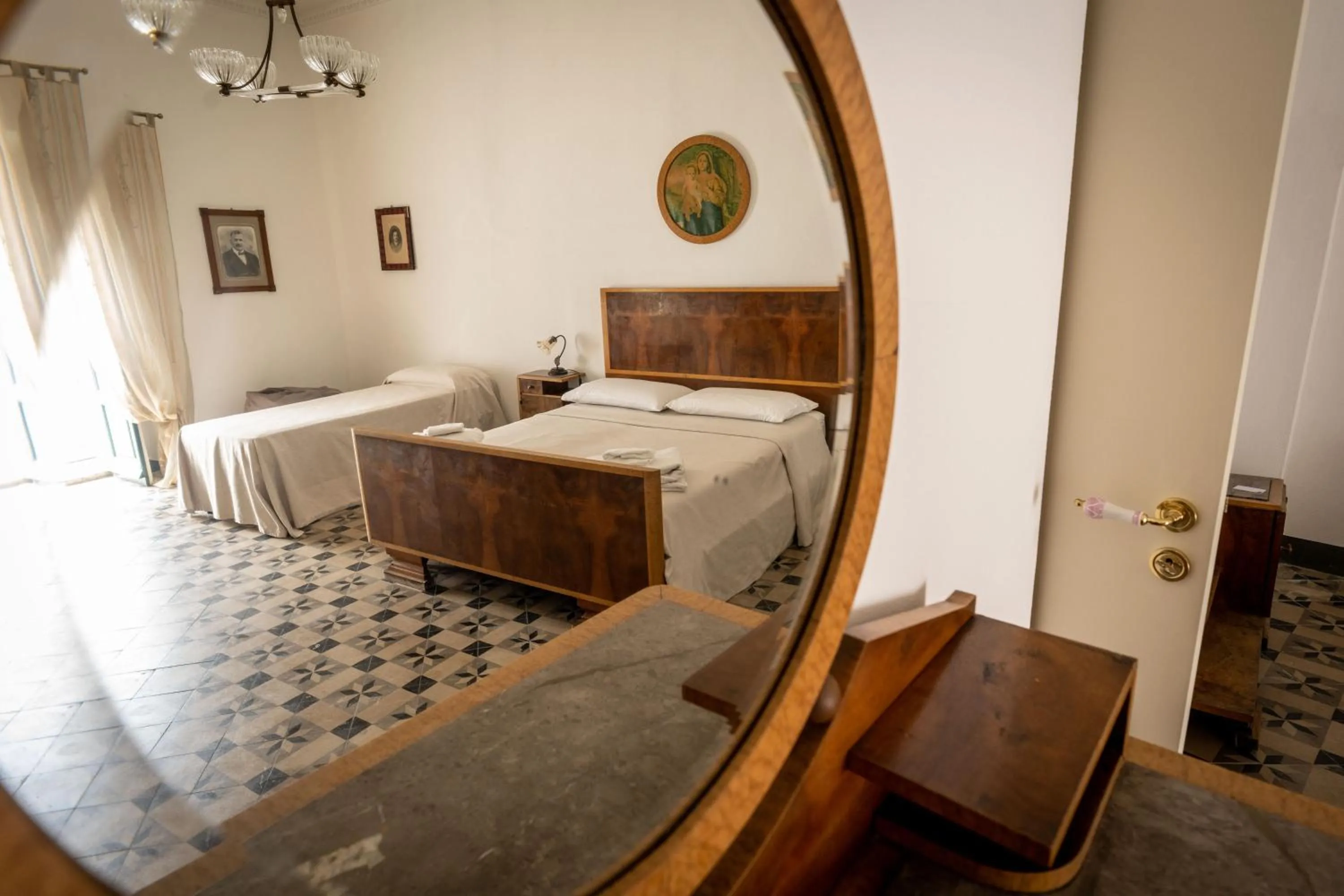 Family Suite with Balcony in Palazzo Restifa