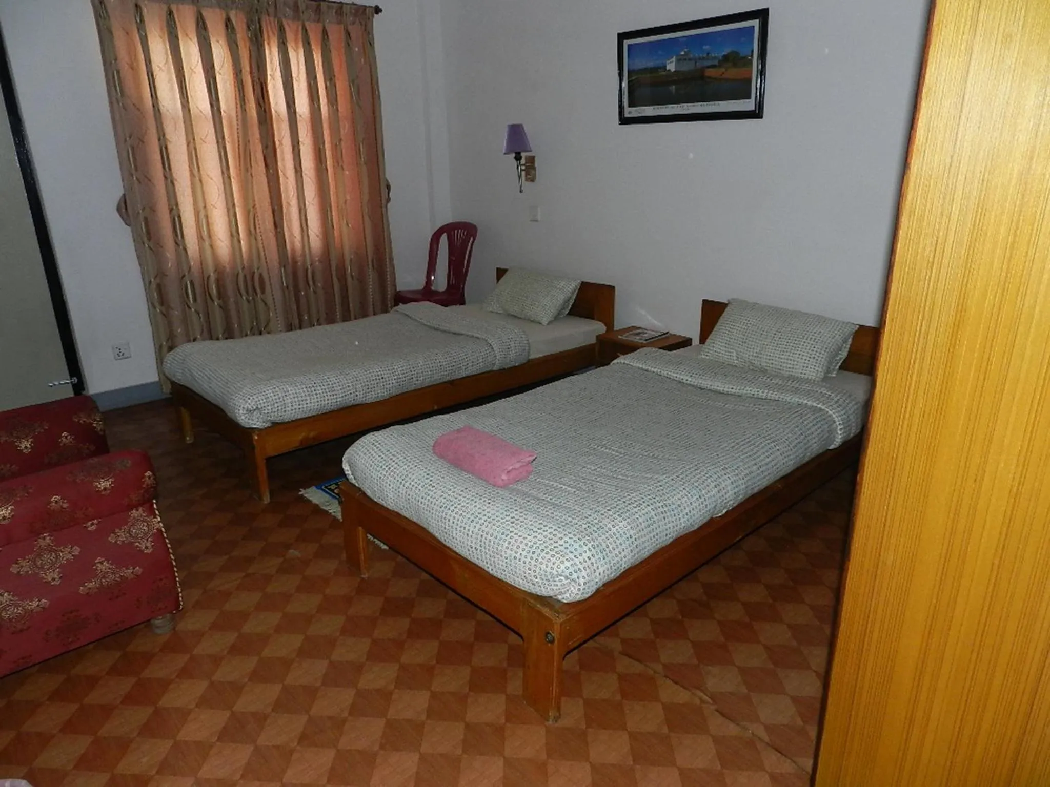 Bed in Le Rhododendron Chambres D'hotes