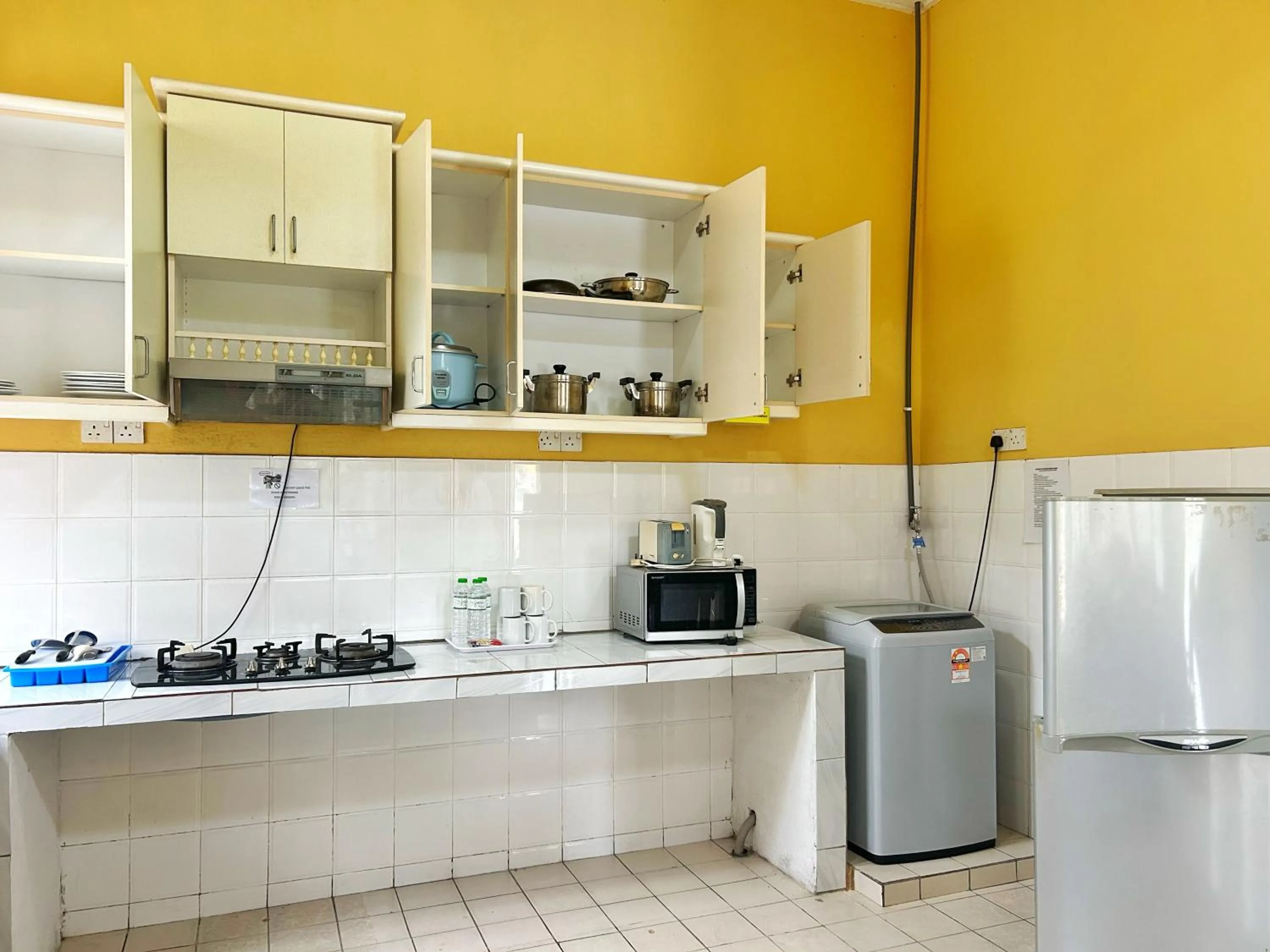 Kitchen or kitchenette in RUMBIA RESORT VILLA Paka Terengganu