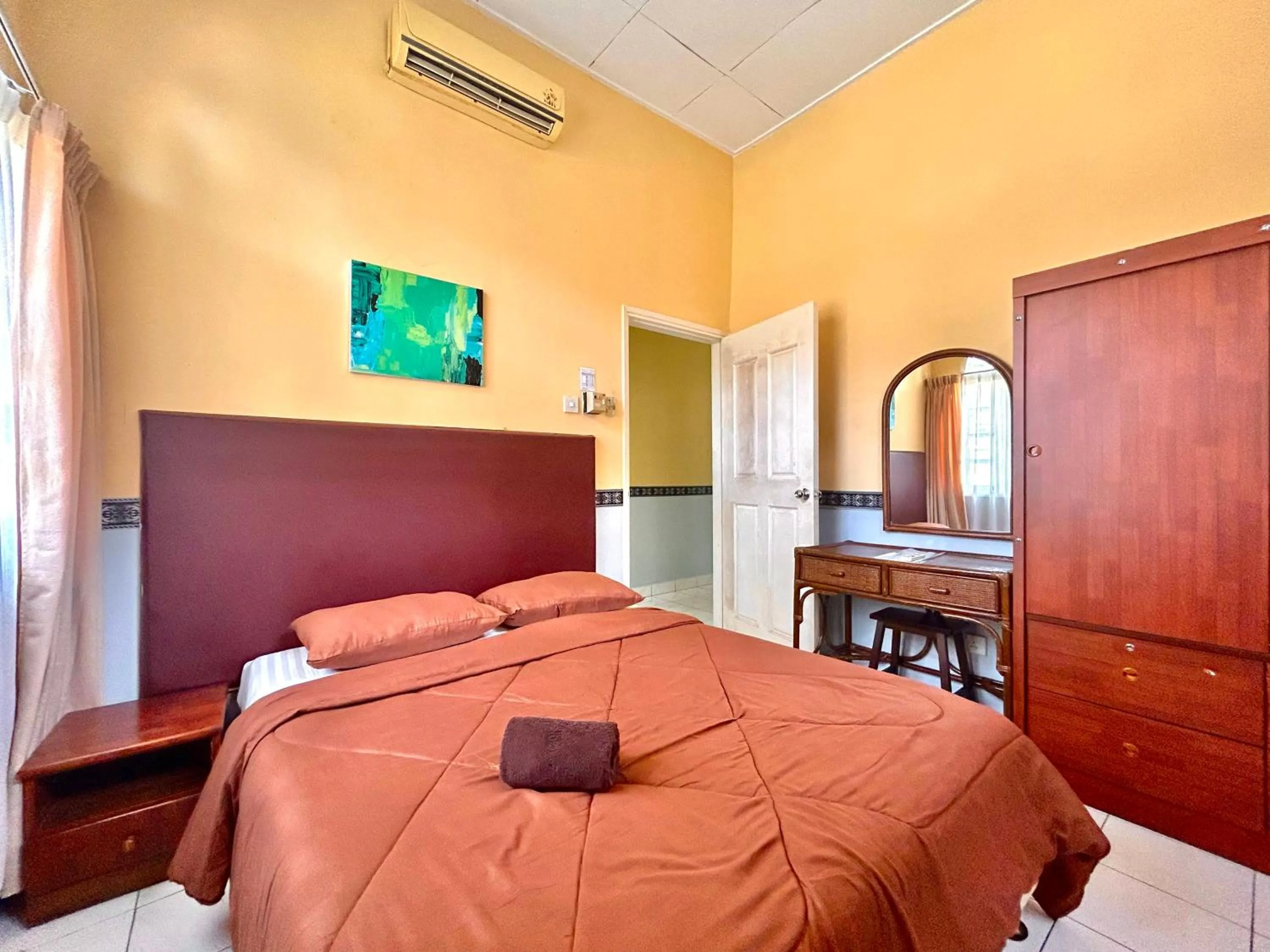 Bed in RUMBIA RESORT VILLA Paka Terengganu