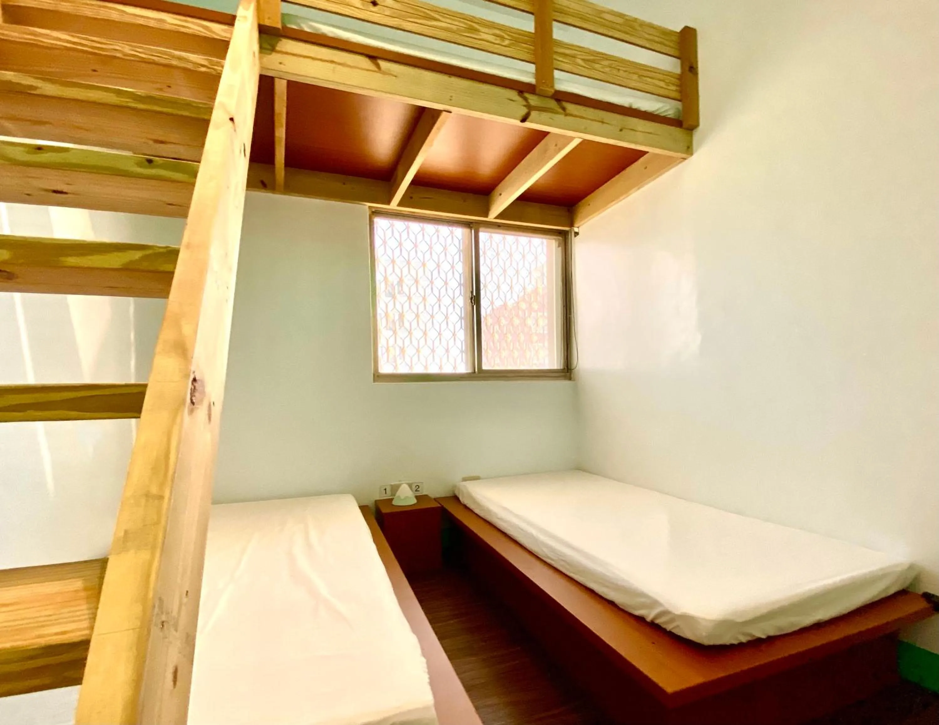 Photo of the whole room, Bed in 澎湖北吉光背包客民宿 Bayhouse Hostel Penghu