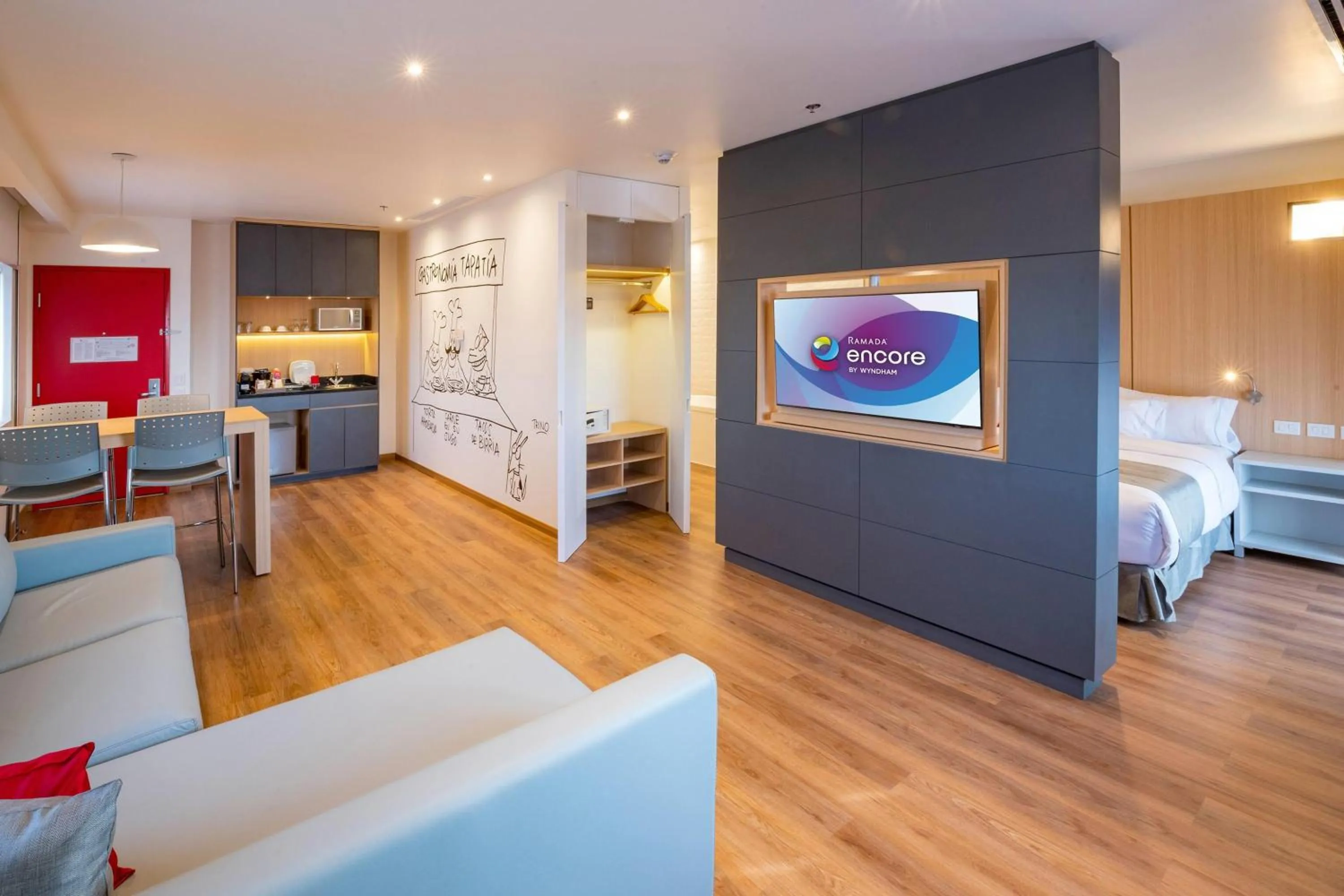 Photo of the whole room, Bed in Ramada Encore by Wyndham Guadalajara Aeropuerto