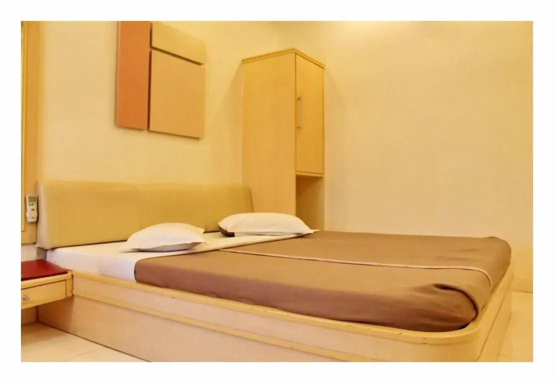 Bed in Hotel Kuber