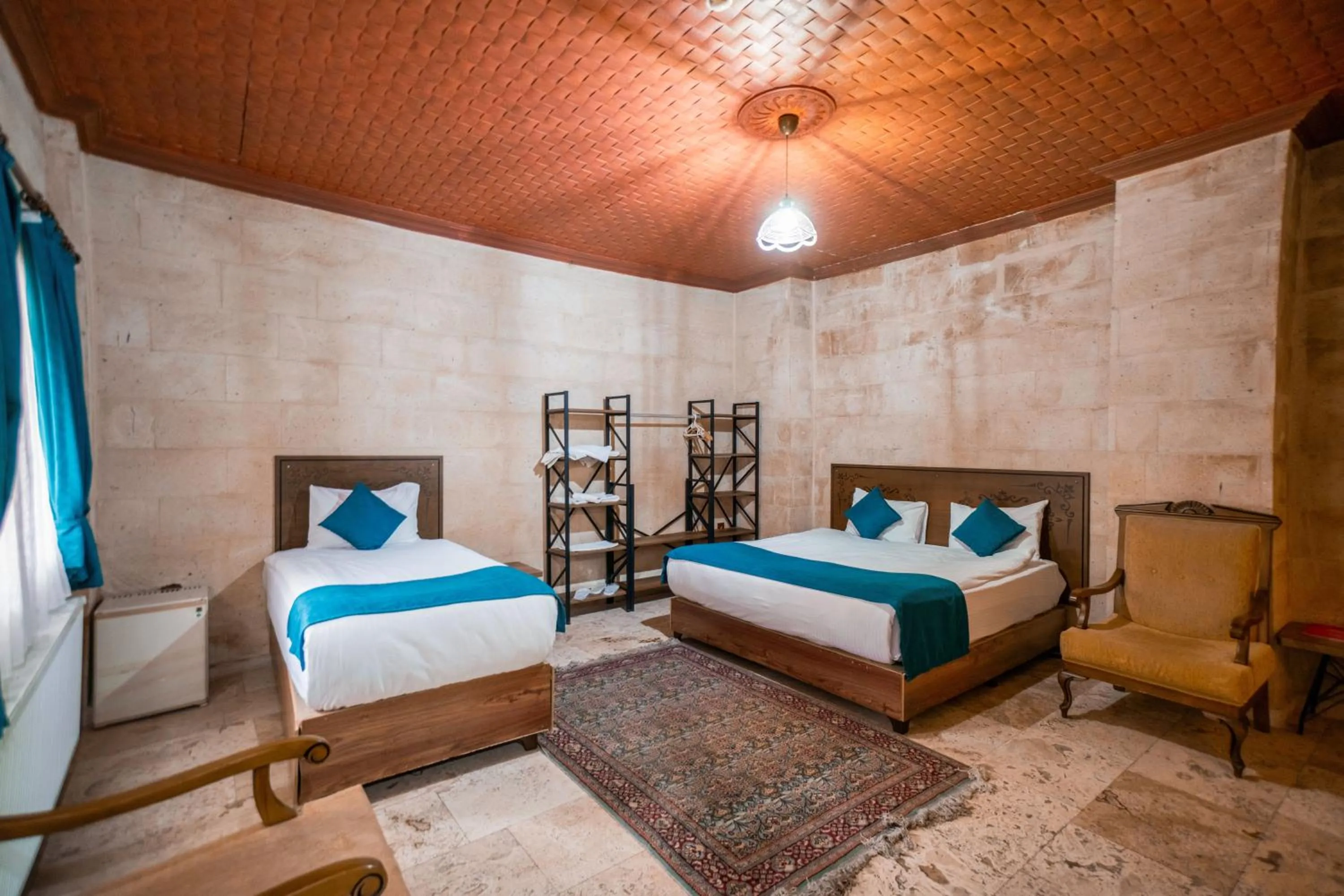 Bed in Azalea Terrace Cave Hotel