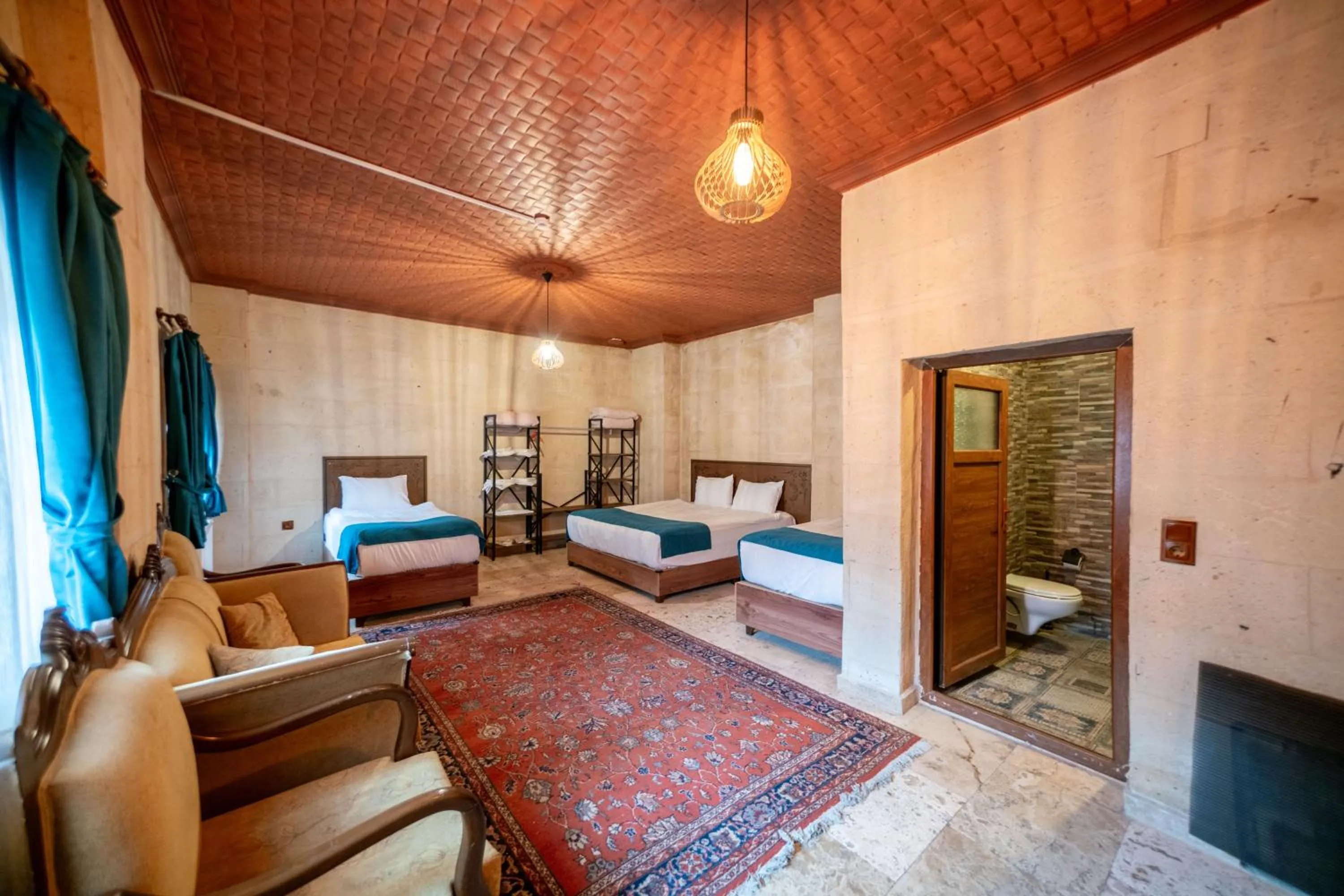 Bed in Azalea Terrace Cave Hotel