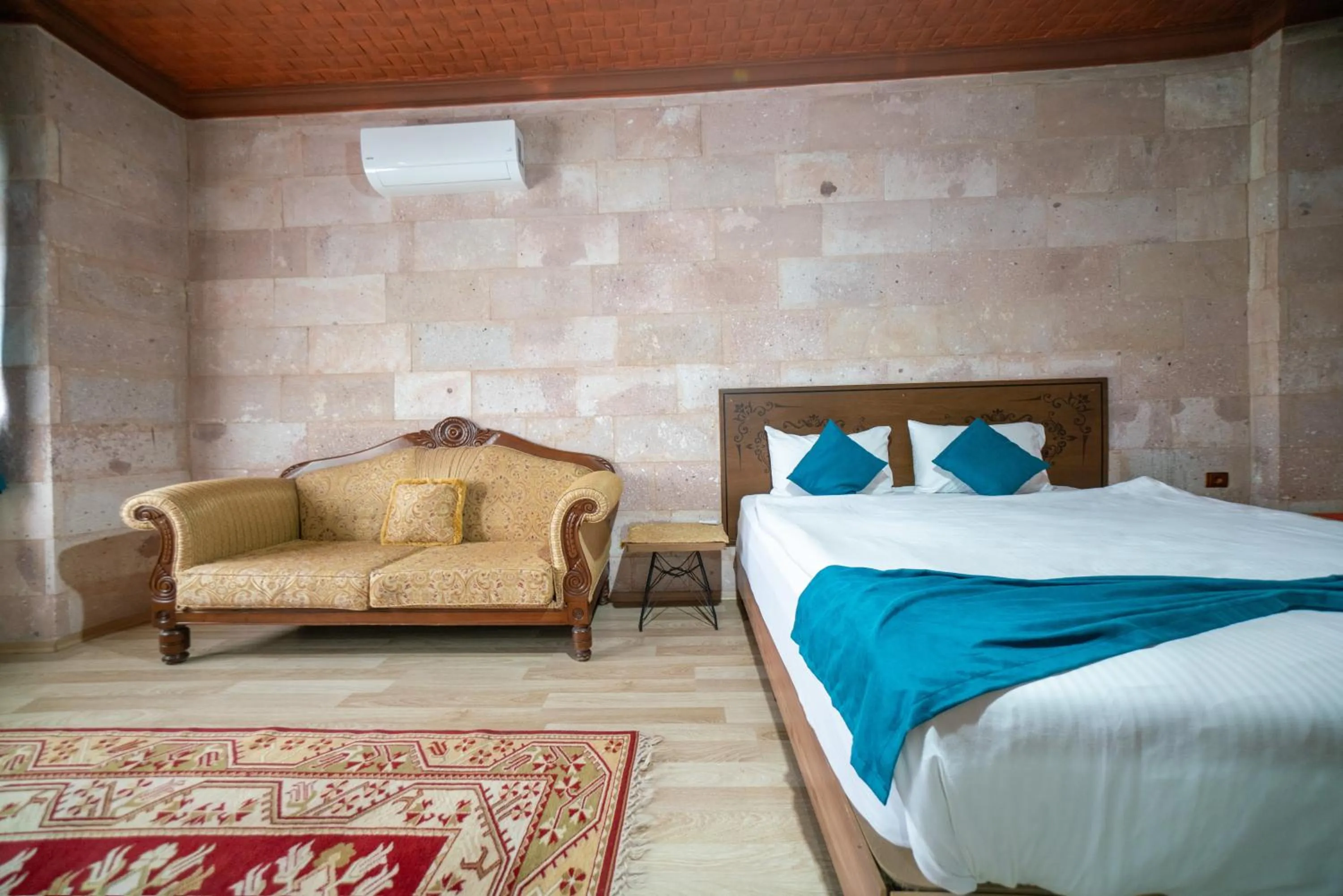 Bed in Azalea Terrace Cave Hotel