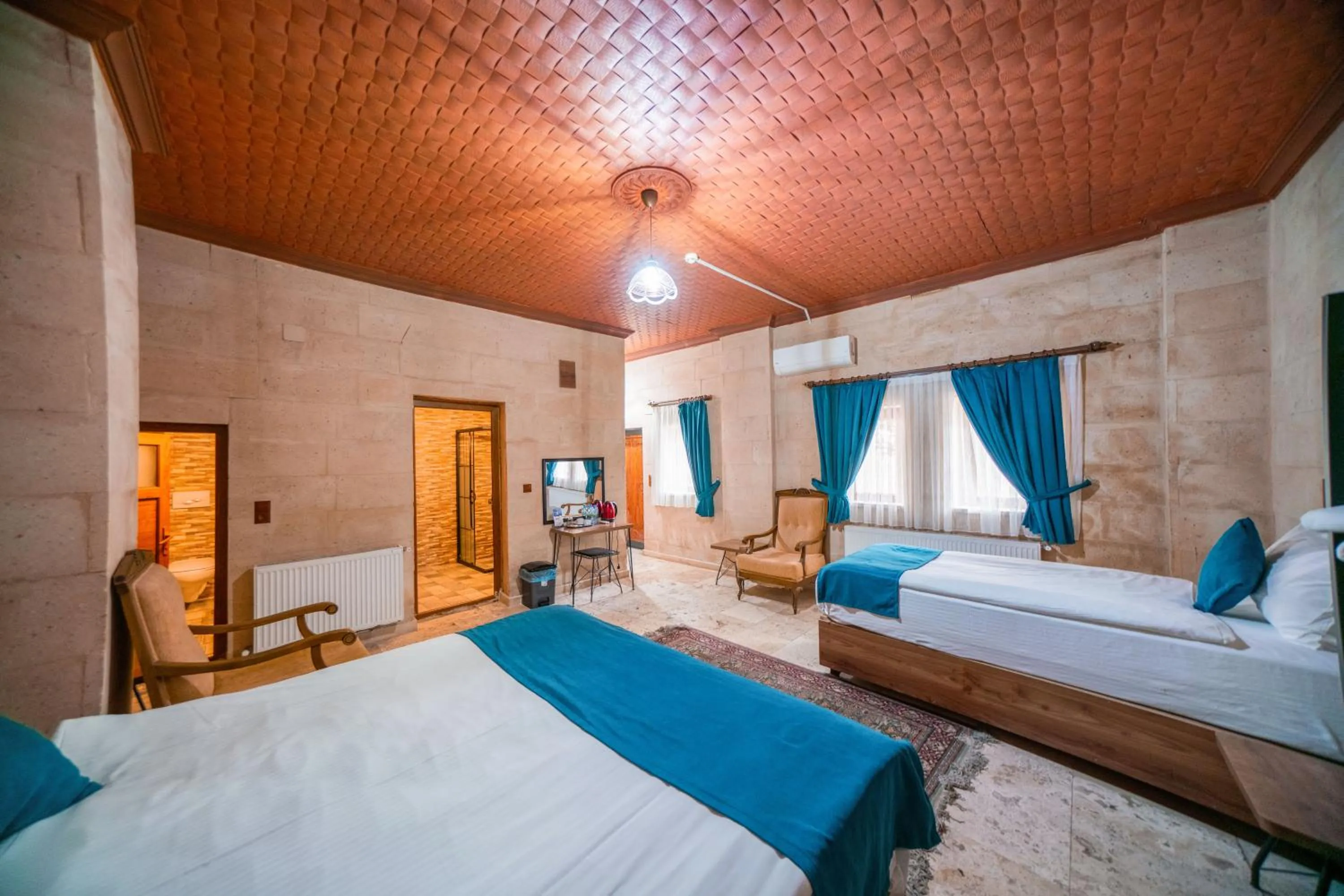 Bed in Azalea Terrace Cave Hotel