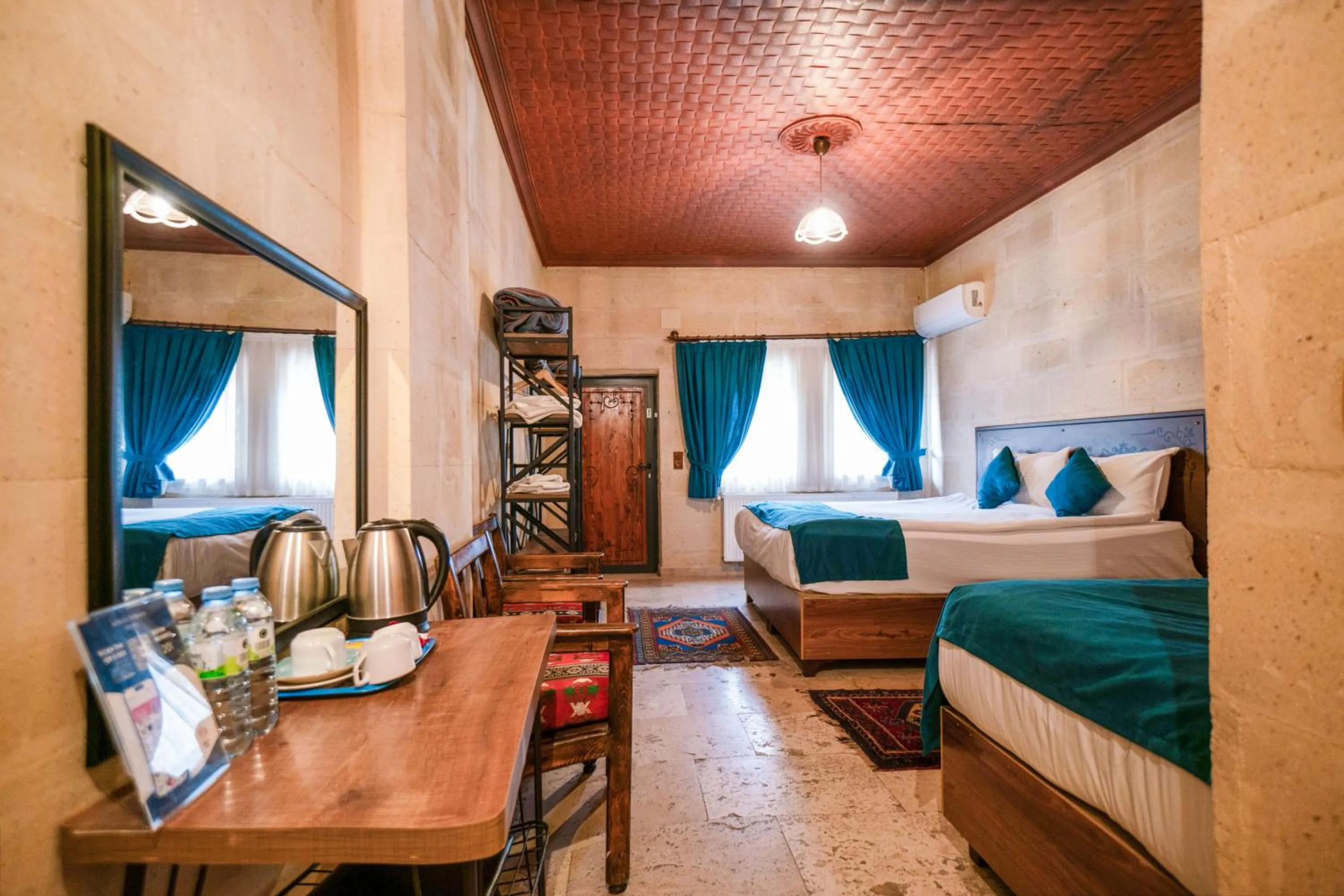 Bed in Azalea Terrace Cave Hotel