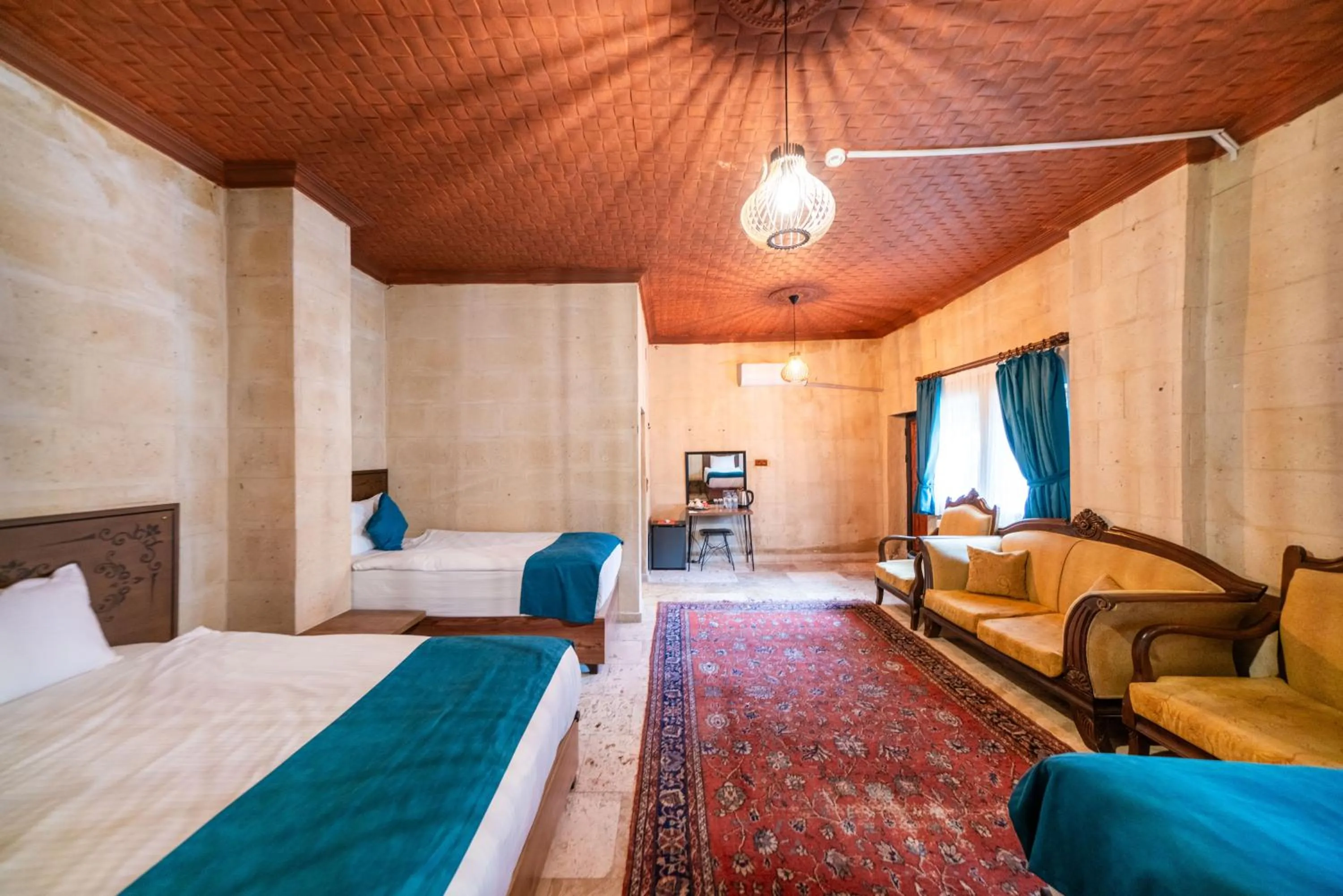 Bed in Azalea Terrace Cave Hotel