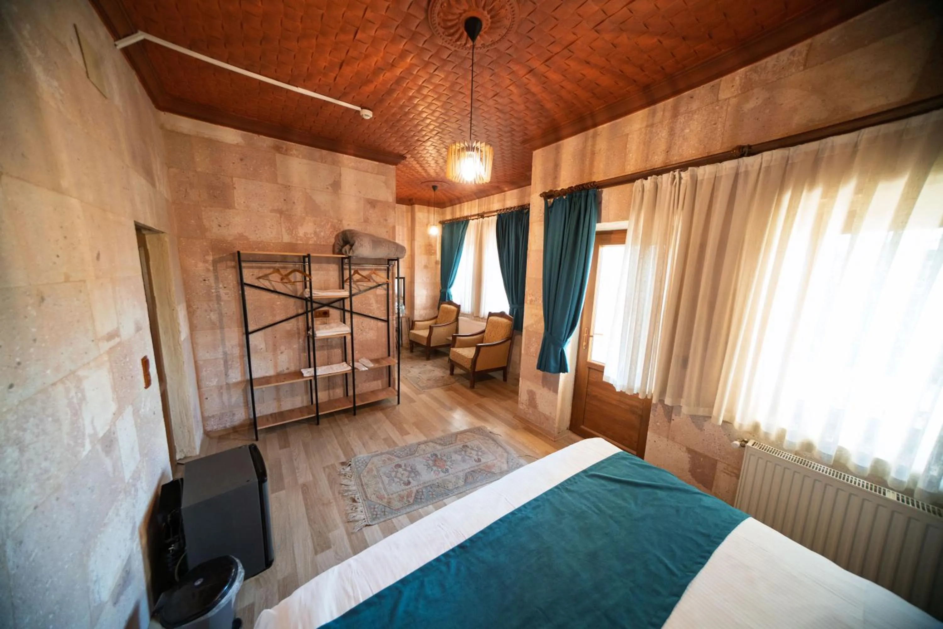 Bed in Azalea Terrace Cave Hotel