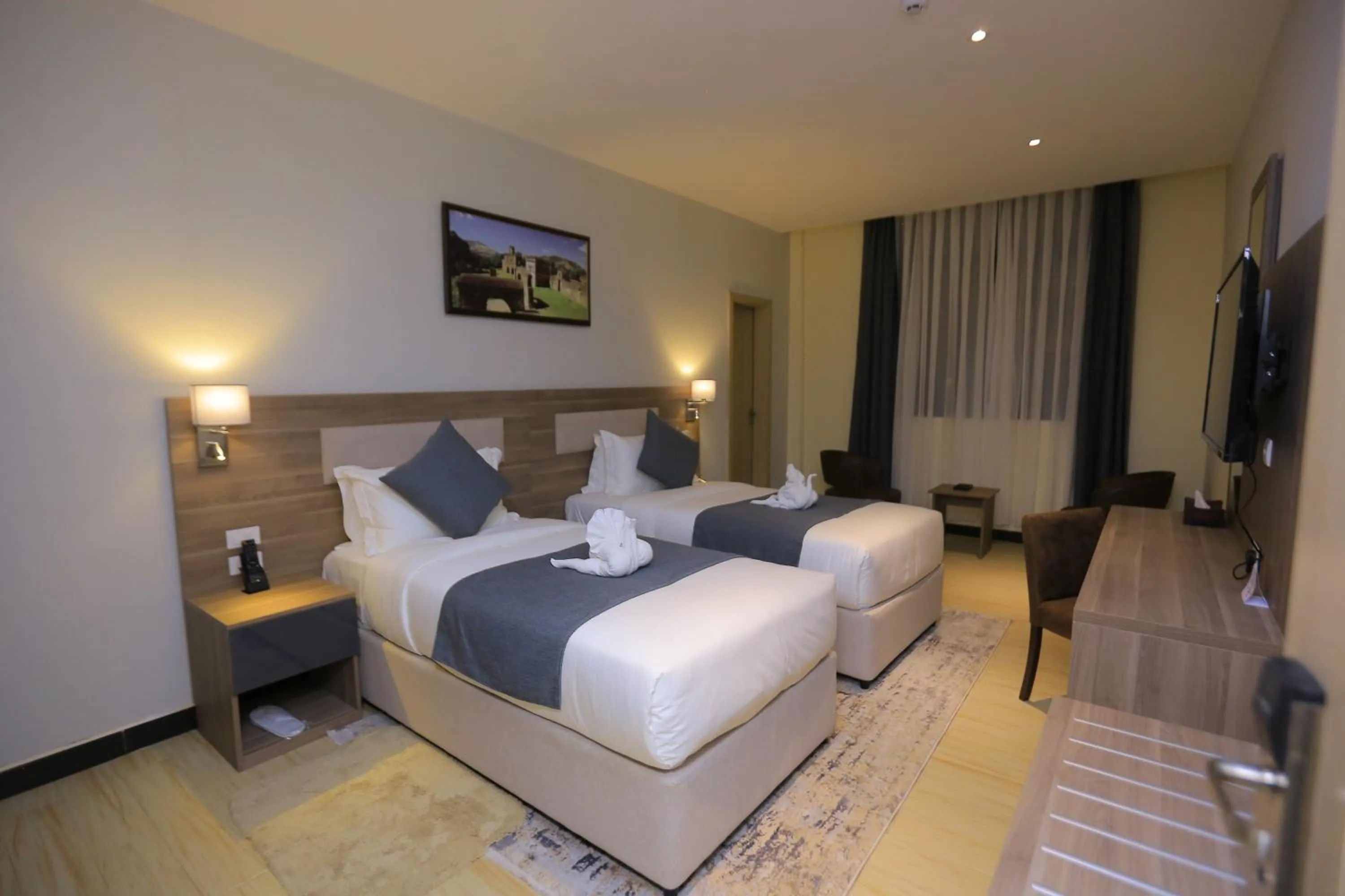 Bed in Triple E Hotel and Spa